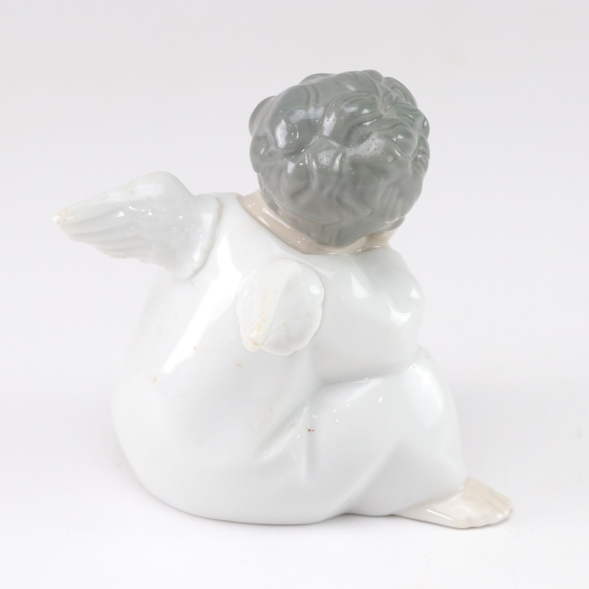 Lladro "Angel Thinking" and Belleek Figurines