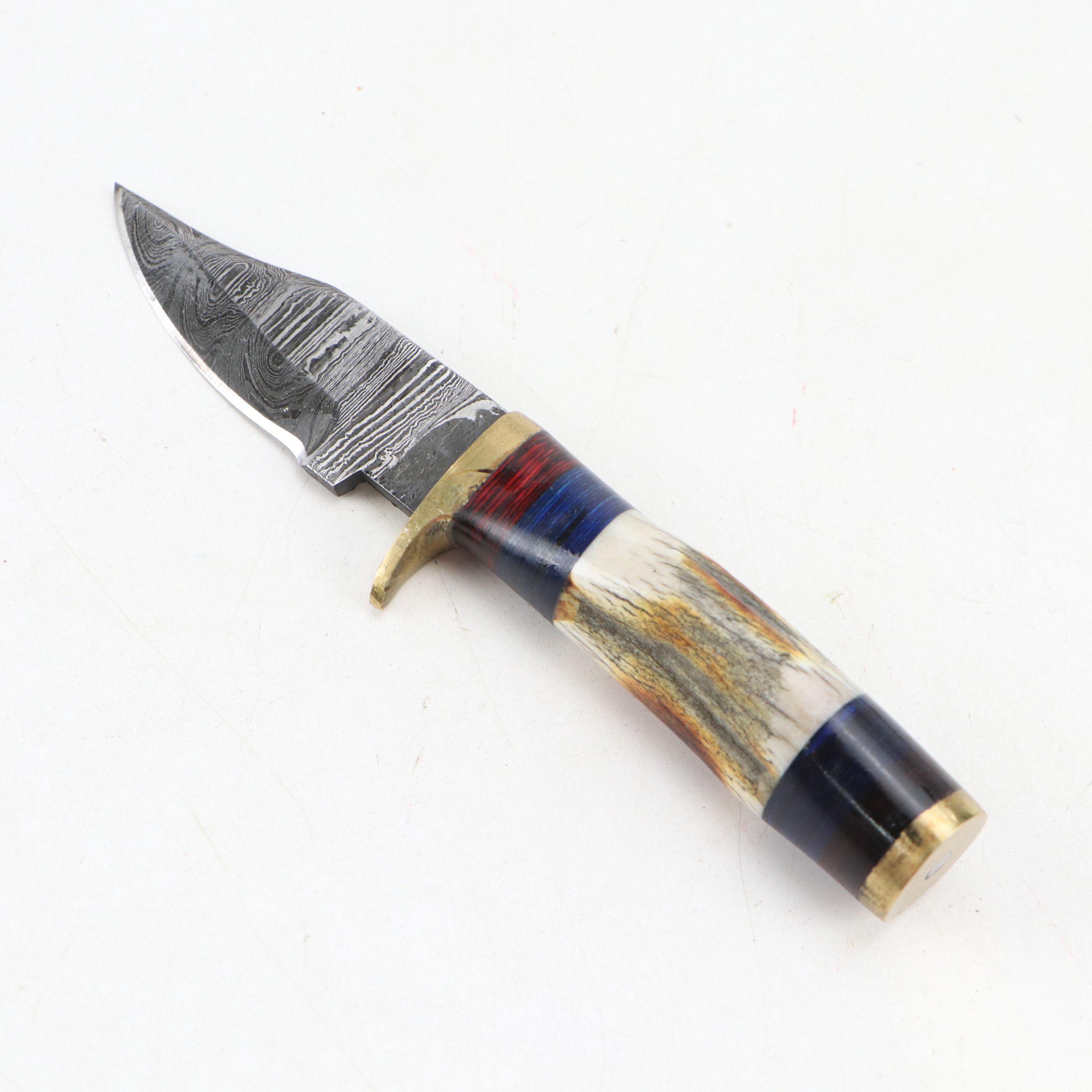 Damascus Steel and Antler Handled Skinner Knives with More