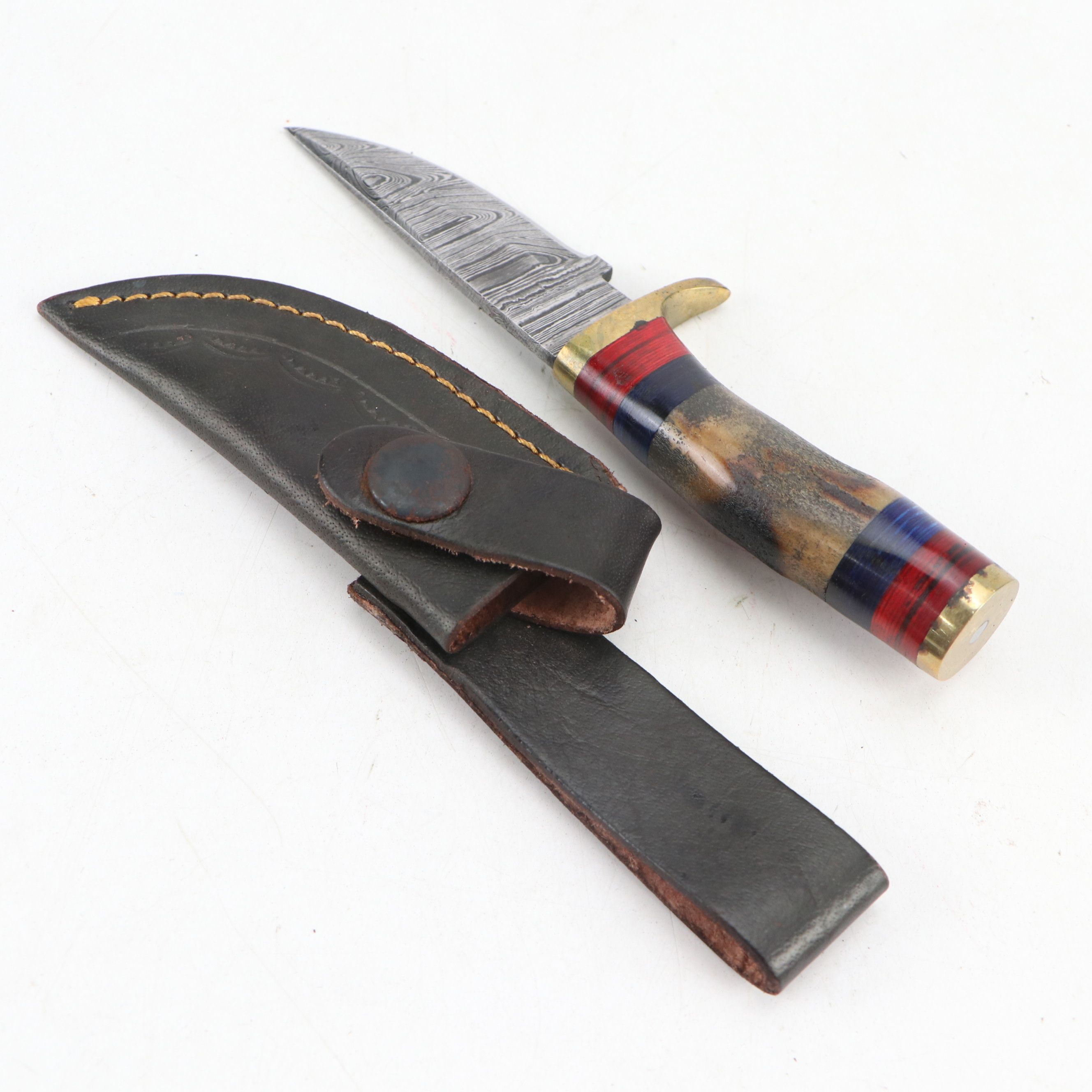Damascus Steel and Antler Handled Skinner Knives with More