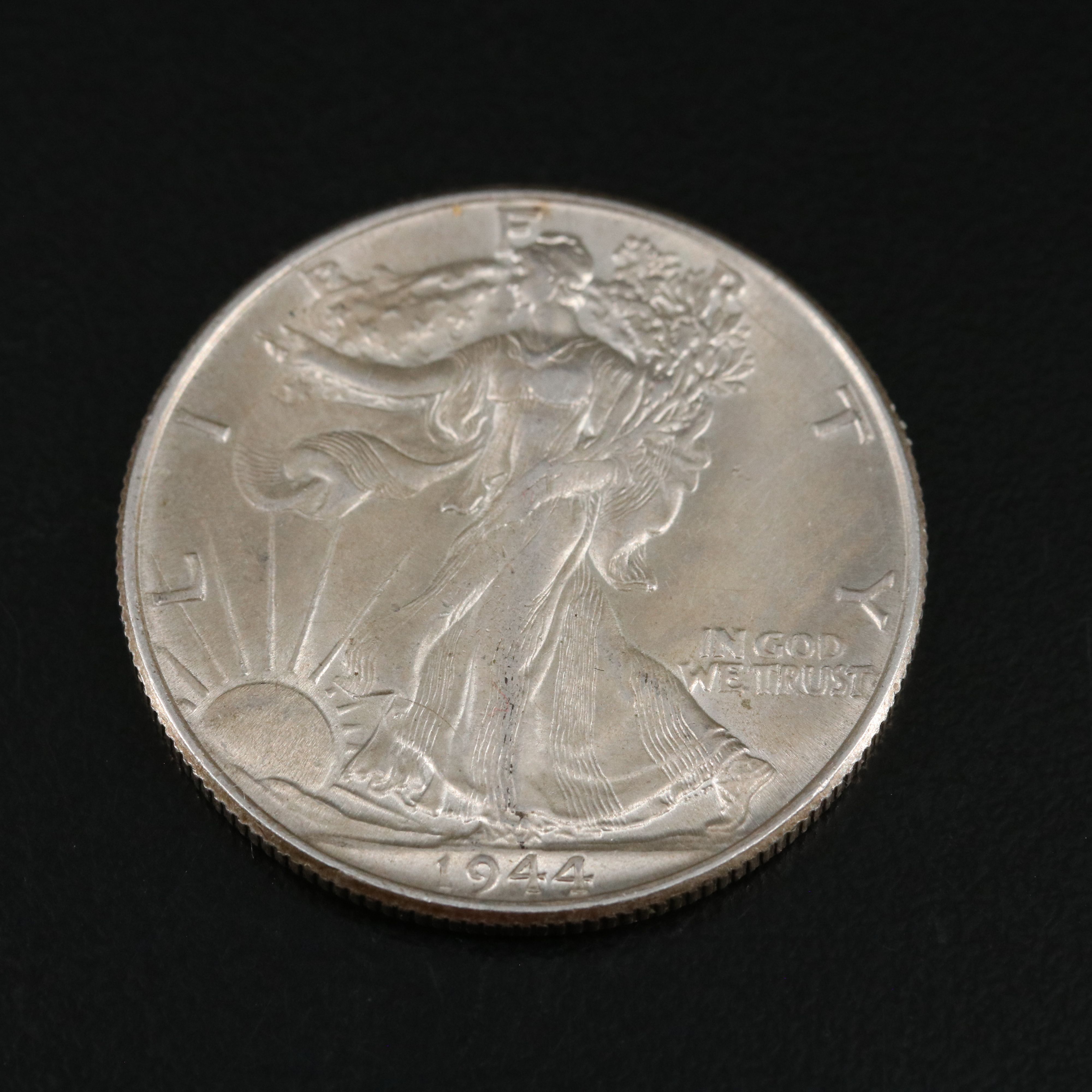 Three Silver United States Coins With Stone Mountain Commemorative