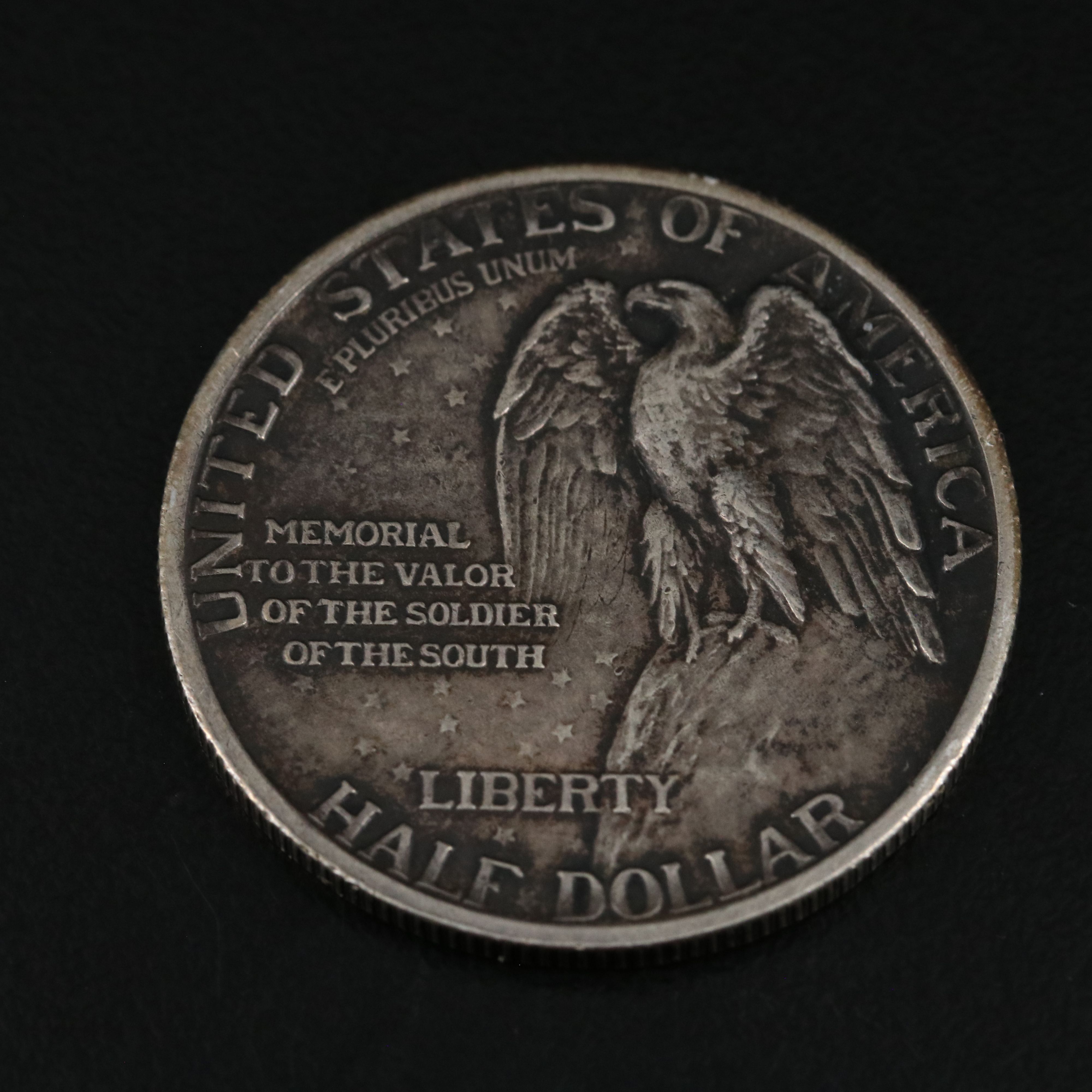 Three Silver United States Coins With Stone Mountain Commemorative