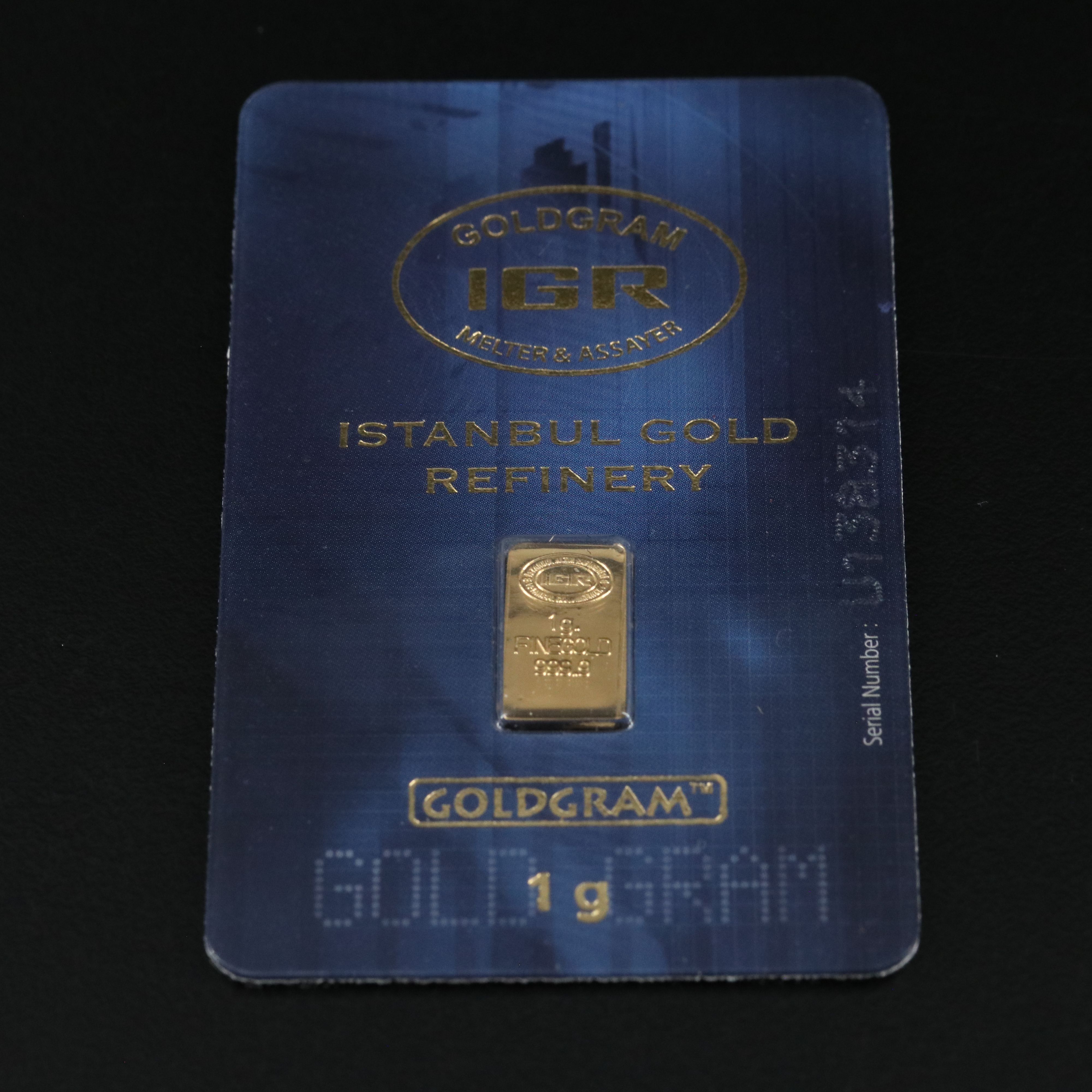 One Gram .9999 Gold Bar and a 1794 Silver Dollar Replica