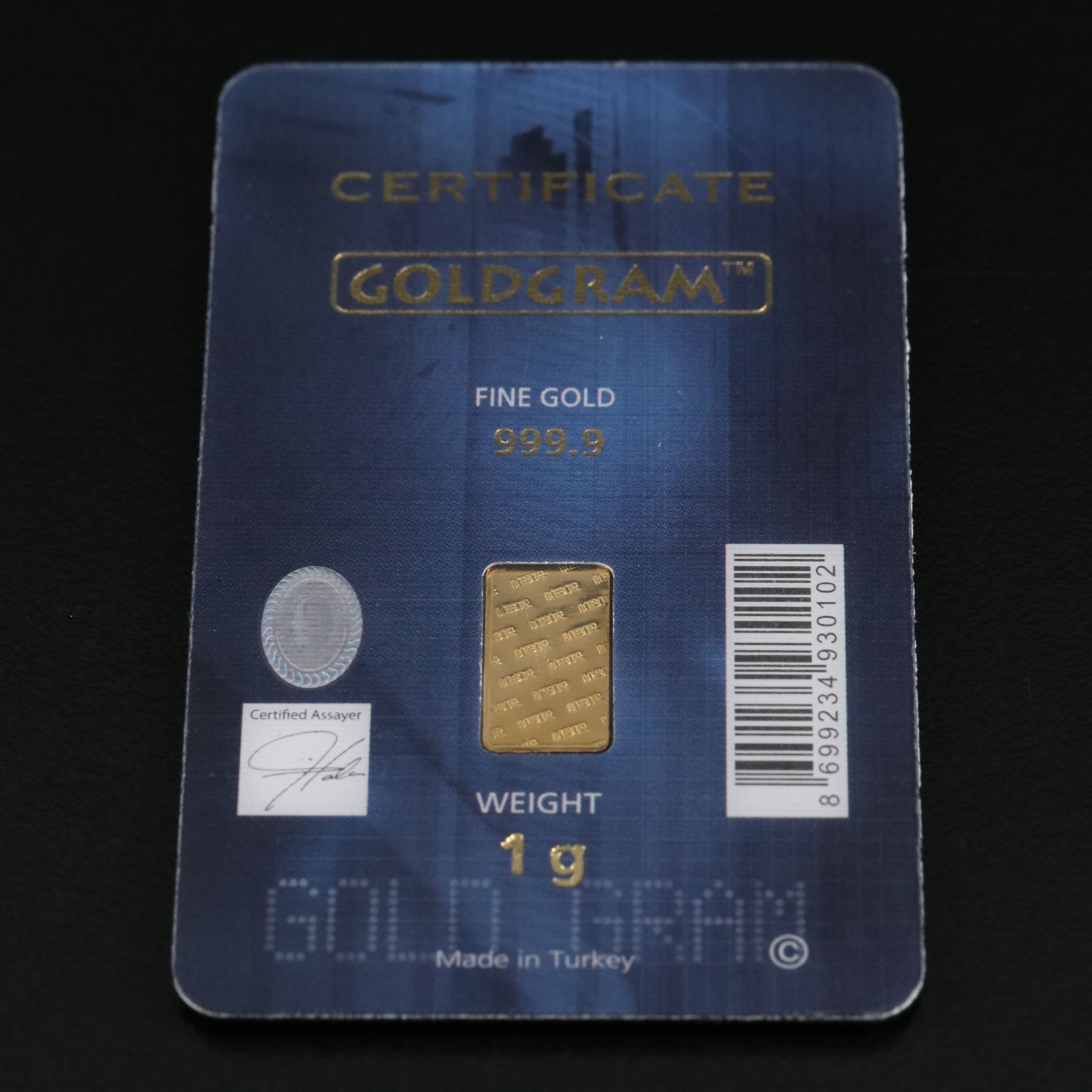 One Gram .9999 Gold Bar and a 1794 Silver Dollar Replica