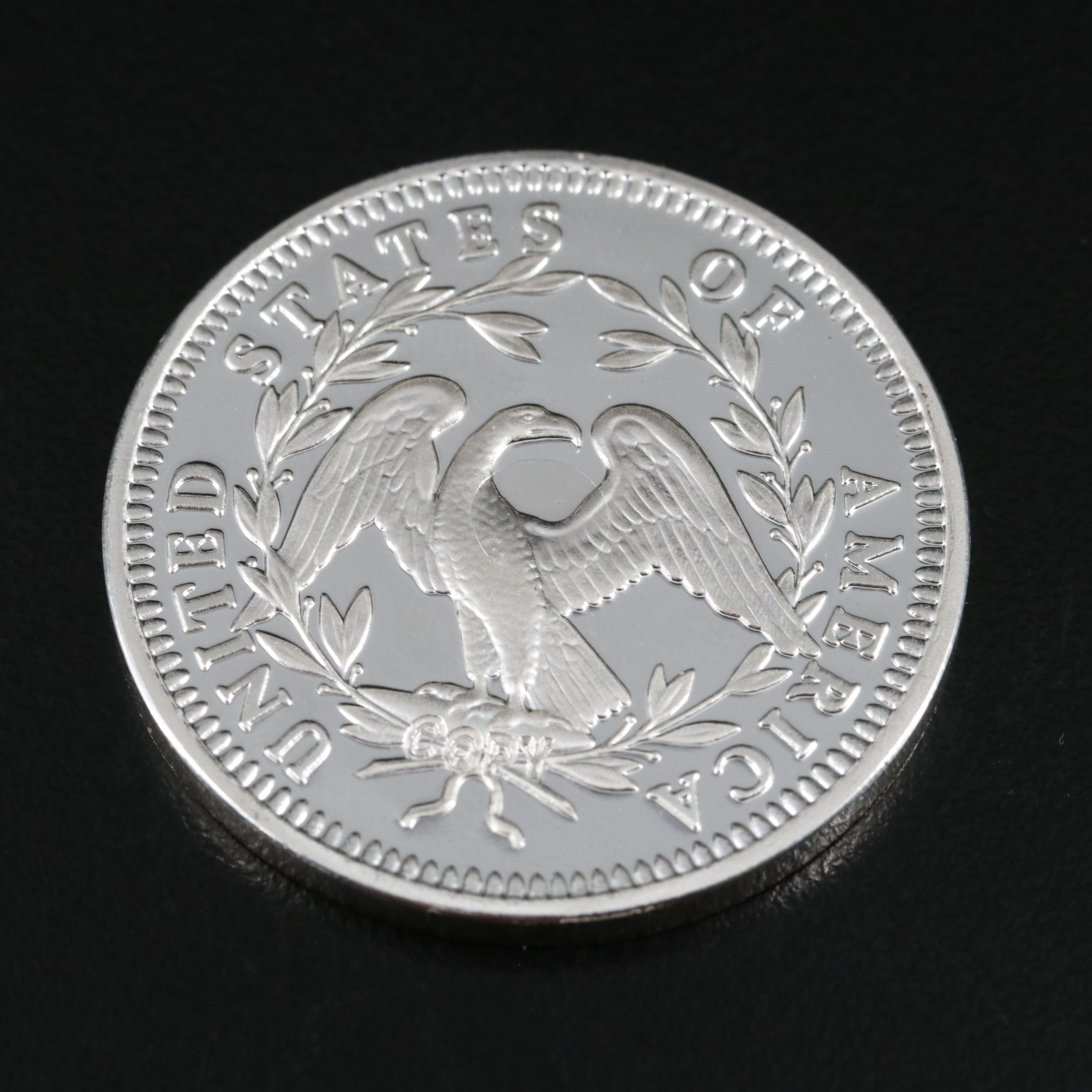 One Gram .9999 Gold Bar and a 1794 Silver Dollar Replica