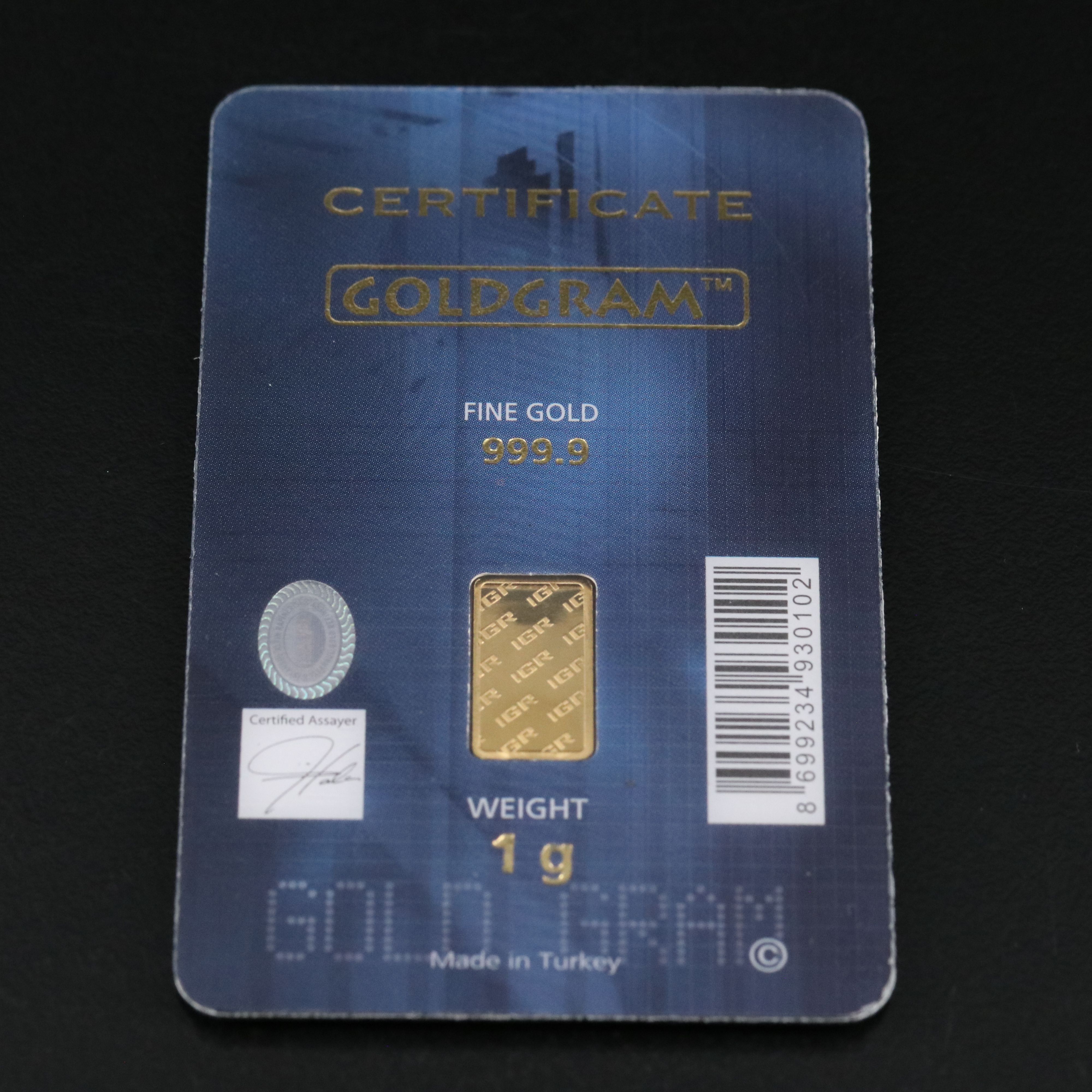 One Gram .9999 Gold Bar and a 1794 Silver Dollar Replica
