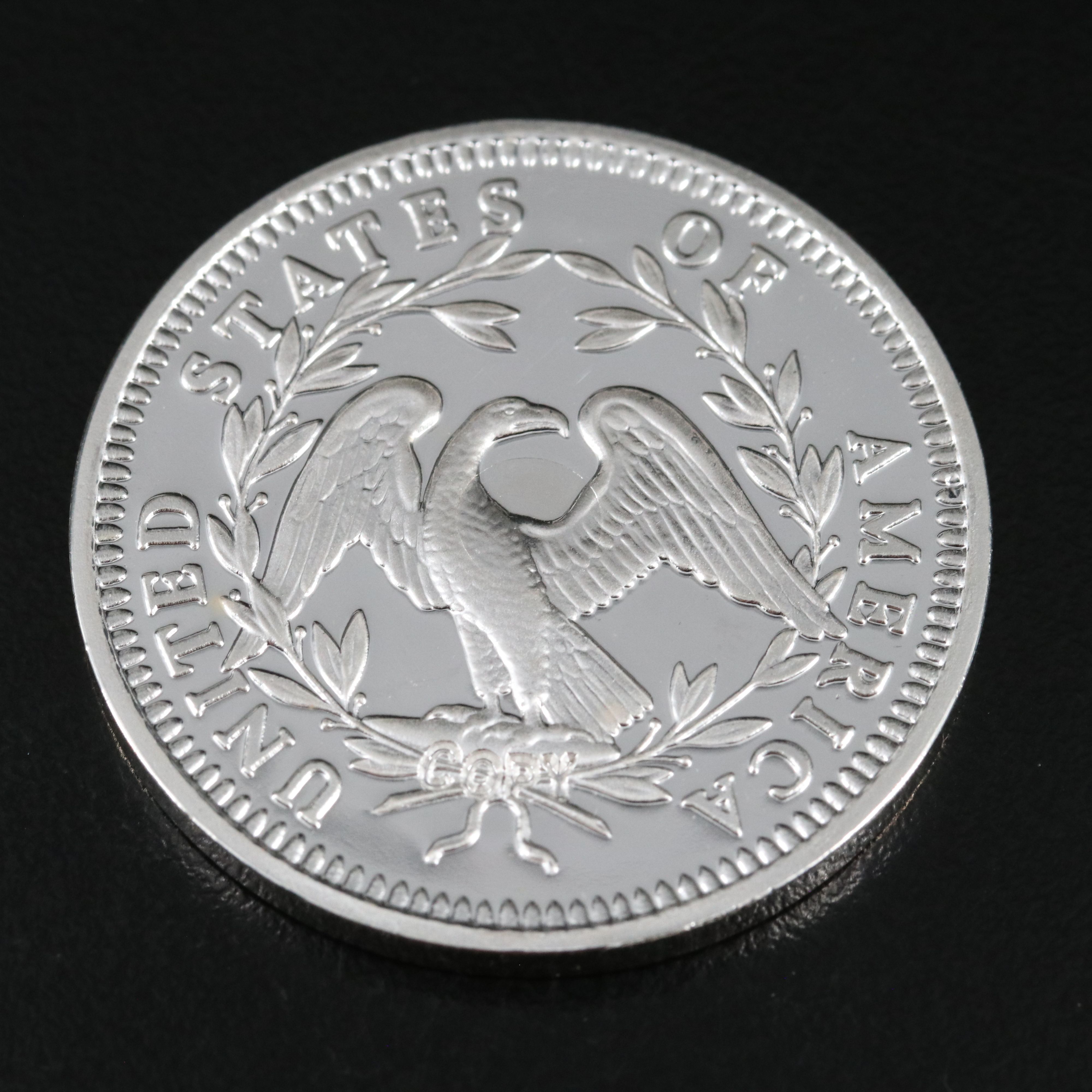 One Gram .9999 Gold Bar and a 1794 Silver Dollar Replica