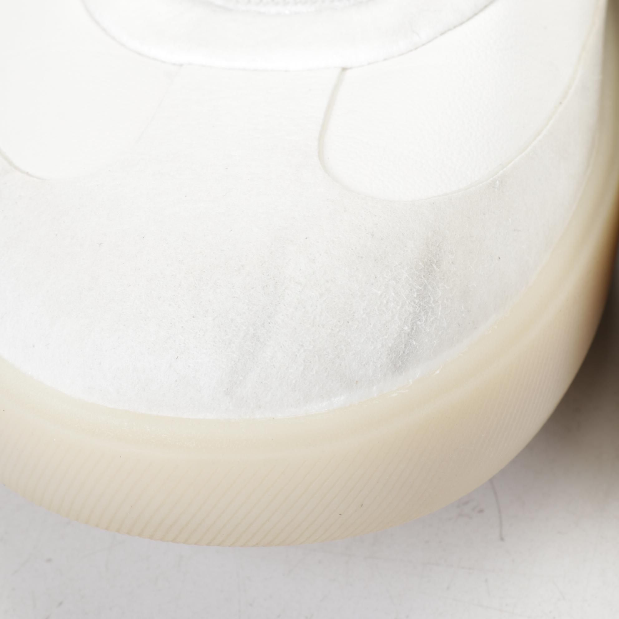 Men's Prada Low Top Sneakers and LuluLemon Lunar New Year Cityverse Sneakers