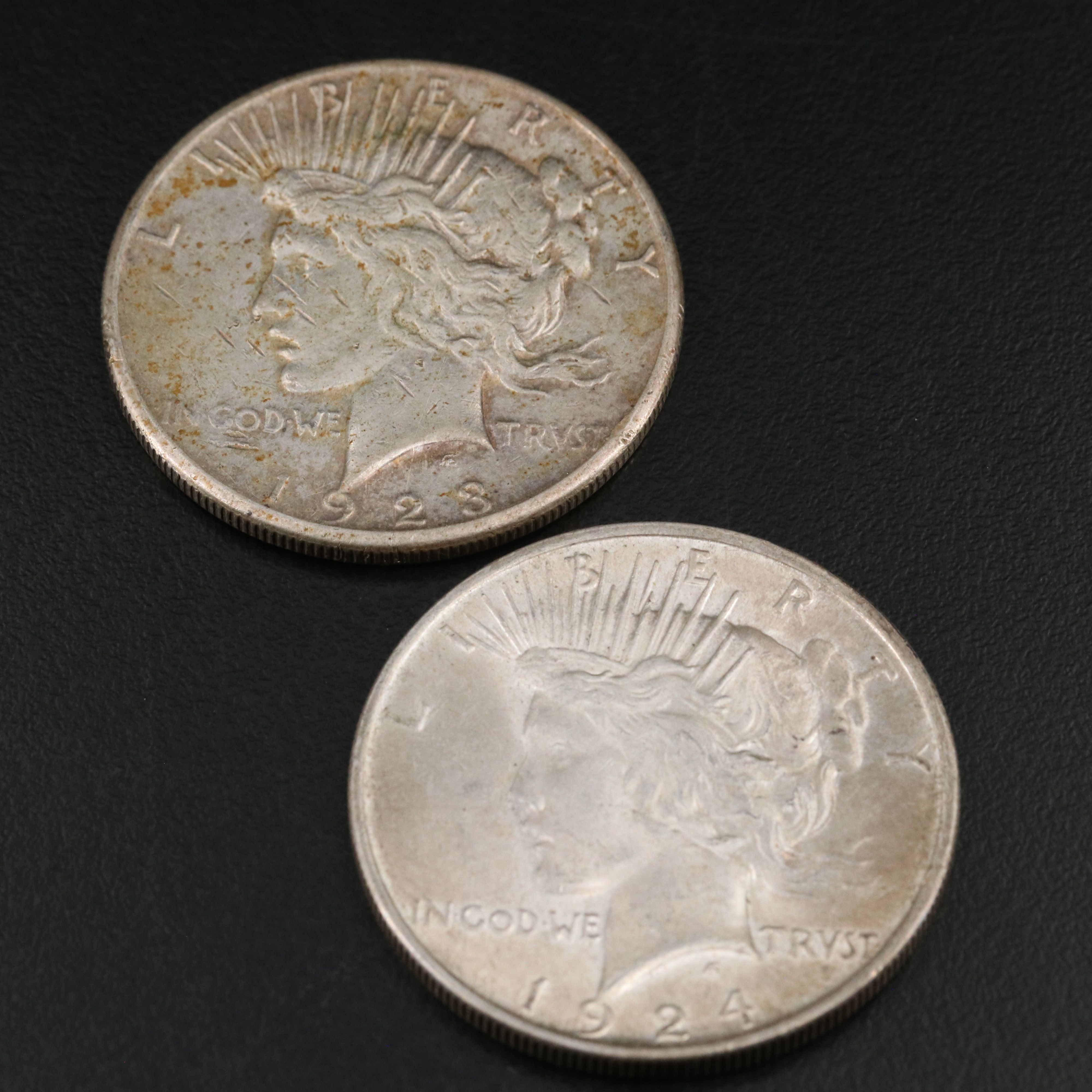 Five Morgan and Peace Dollars with a 1890-O