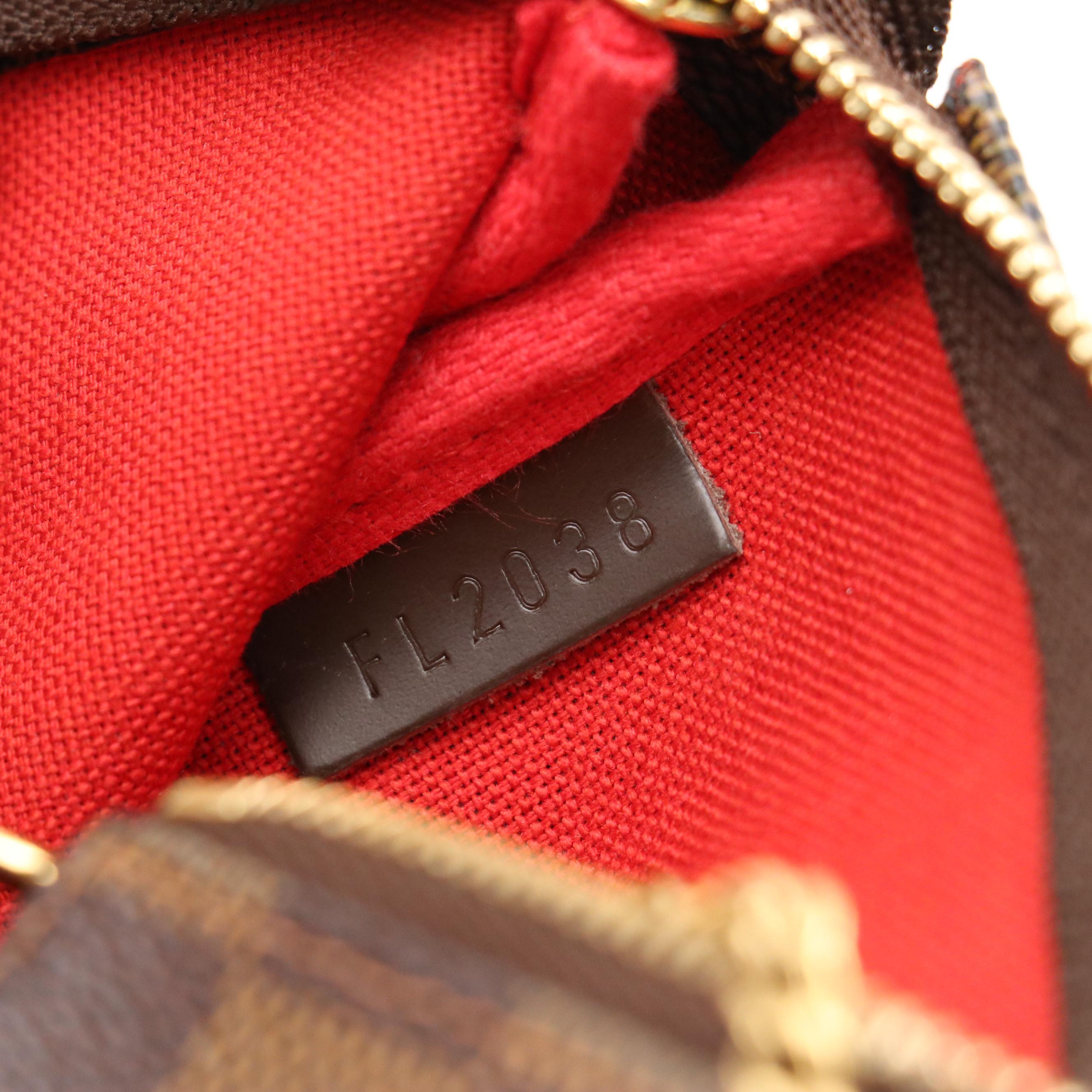 Louis Vuitton Mini Pochette Accessoires in Damier Ebene Canvas with Chain Strap