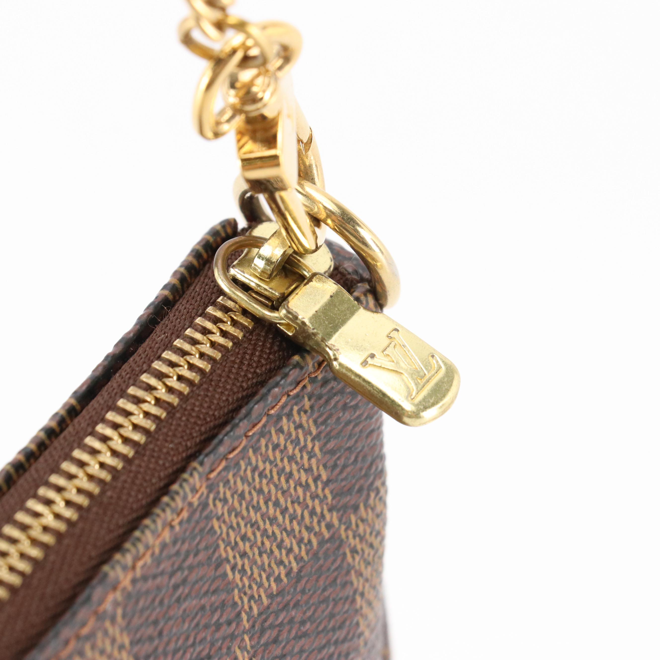 Louis Vuitton Mini Pochette Accessoires in Damier Ebene Canvas with Chain Strap