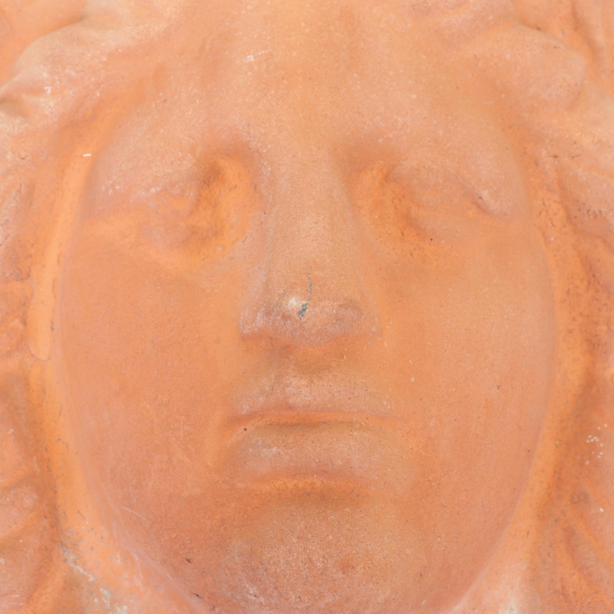 Two Neoclassical Terracotta Figural Wall Hanging Planters