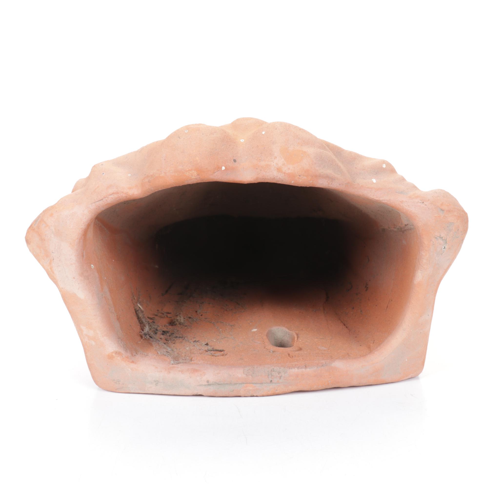 Two Neoclassical Terracotta Figural Wall Hanging Planters