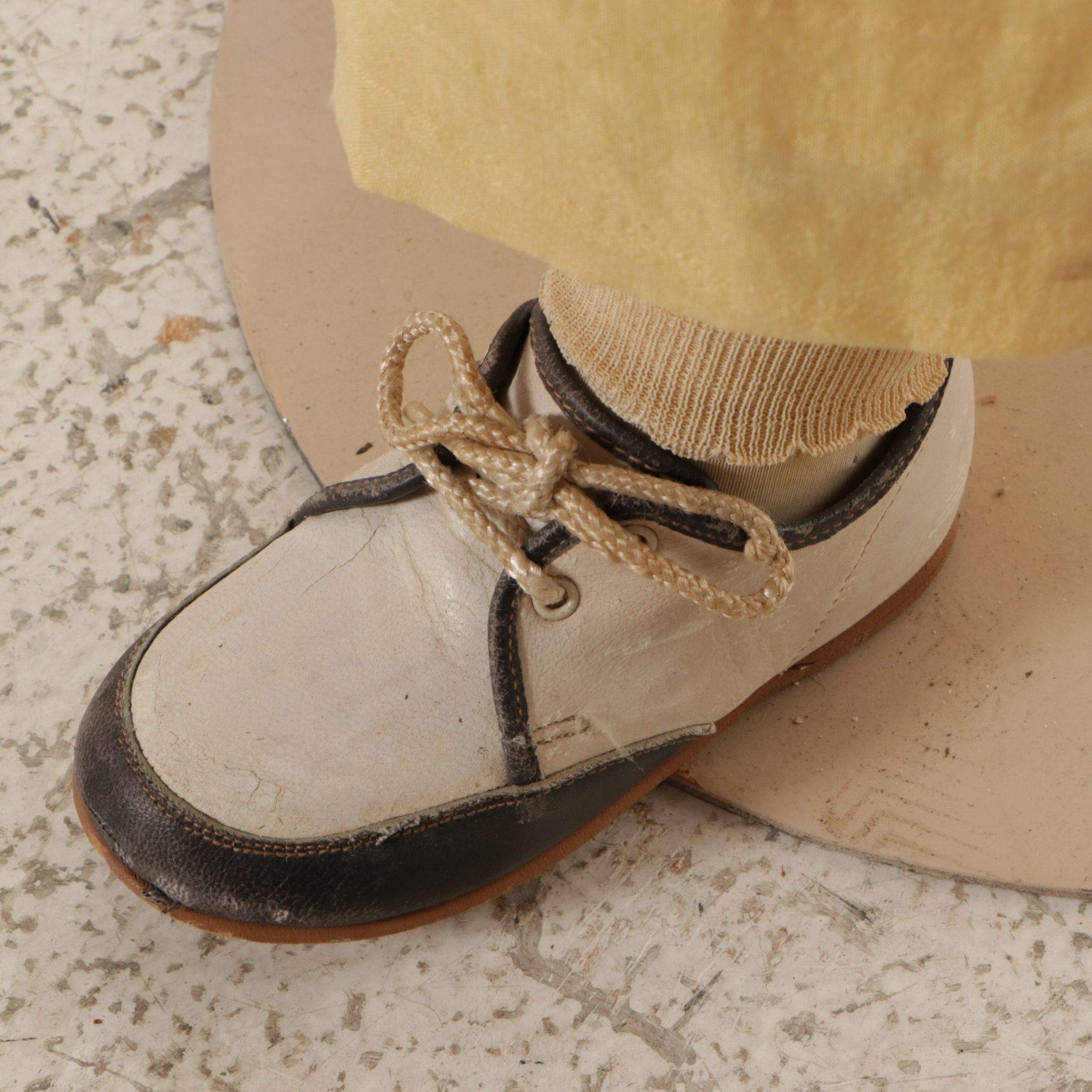 Little Boy Store Mannequin Wearing Yellow Jumper and Shirt