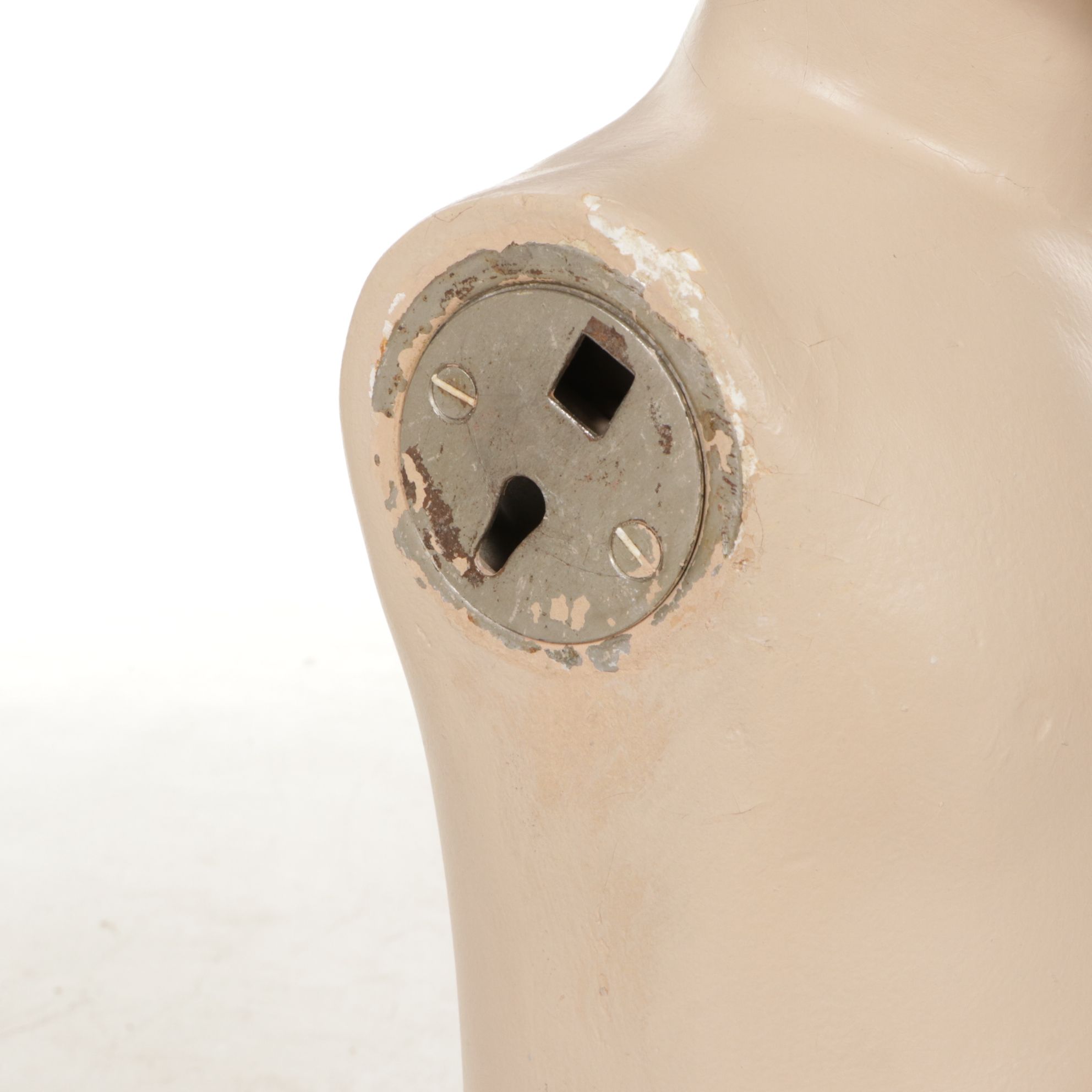 Little Boy Store Mannequin Wearing Yellow Jumper and Shirt