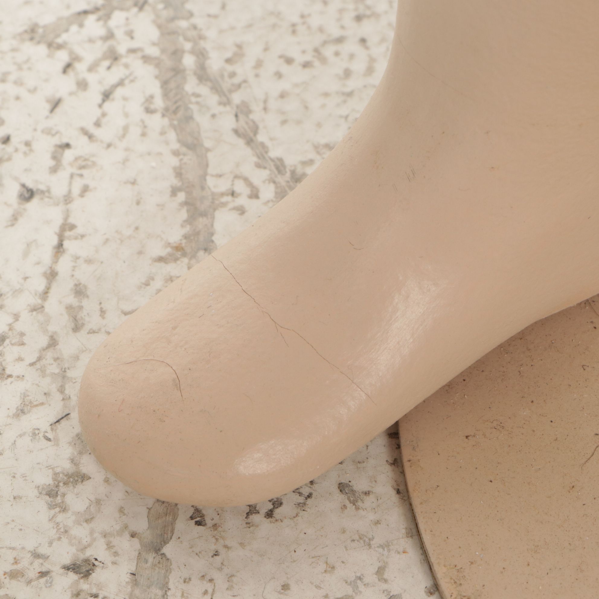 Little Boy Store Mannequin Wearing Yellow Jumper and Shirt