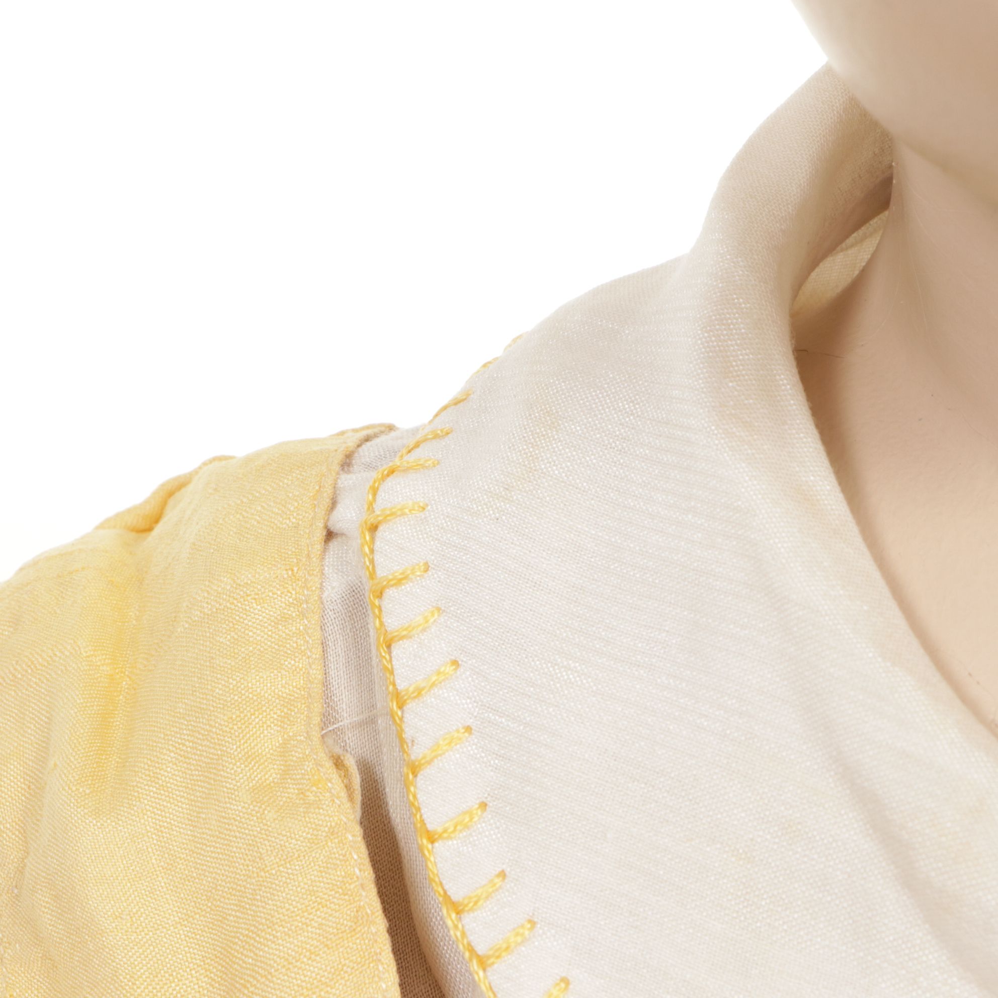 Little Boy Store Mannequin Wearing Yellow Jumper and Shirt