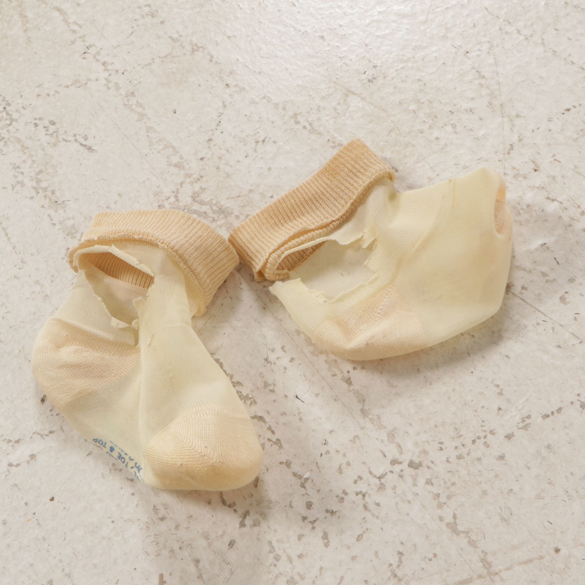 Little Boy Store Mannequin Wearing Yellow Jumper and Shirt