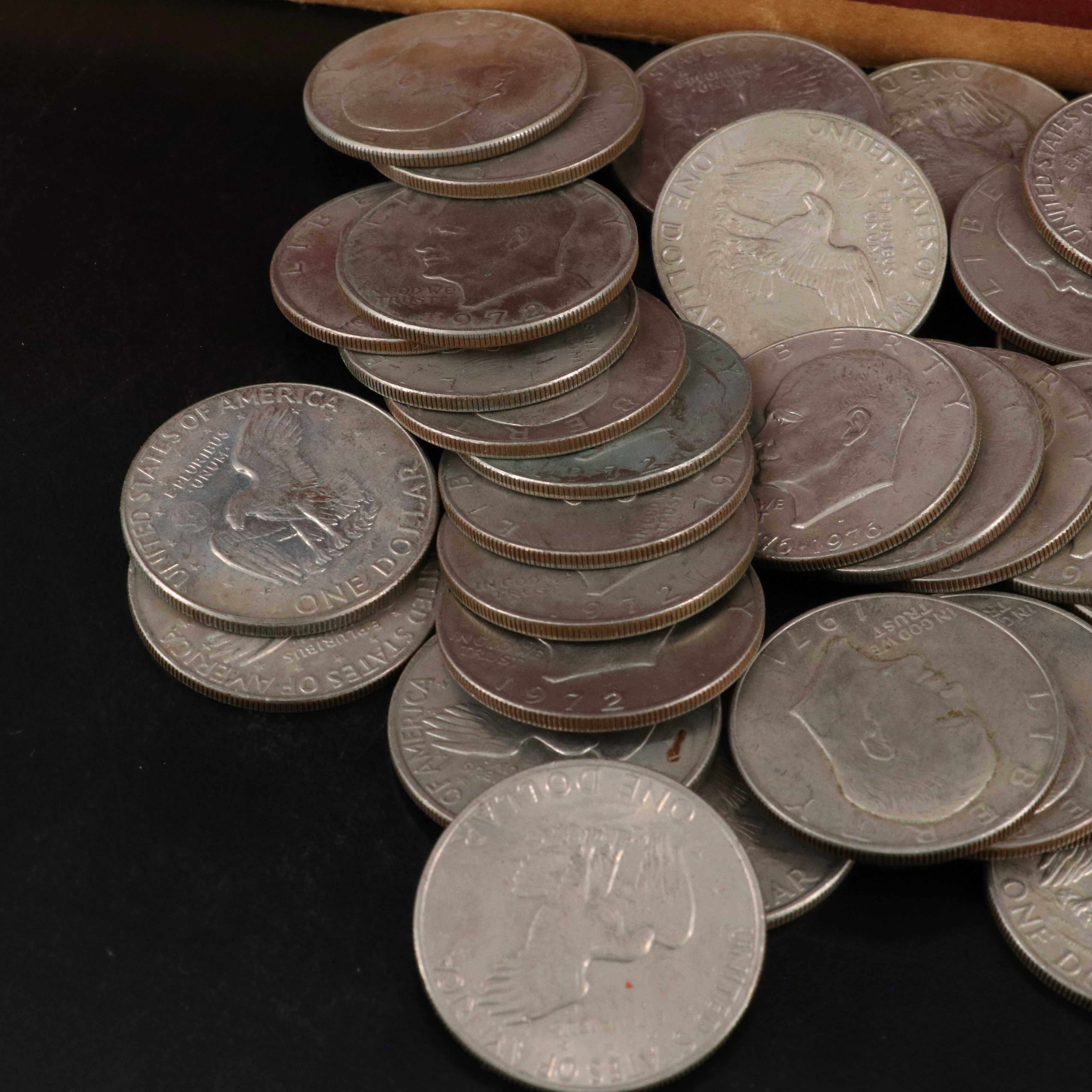 Collection of 2050 State Quarters in Bank Rolls and 68 Eisenhower Dollars
