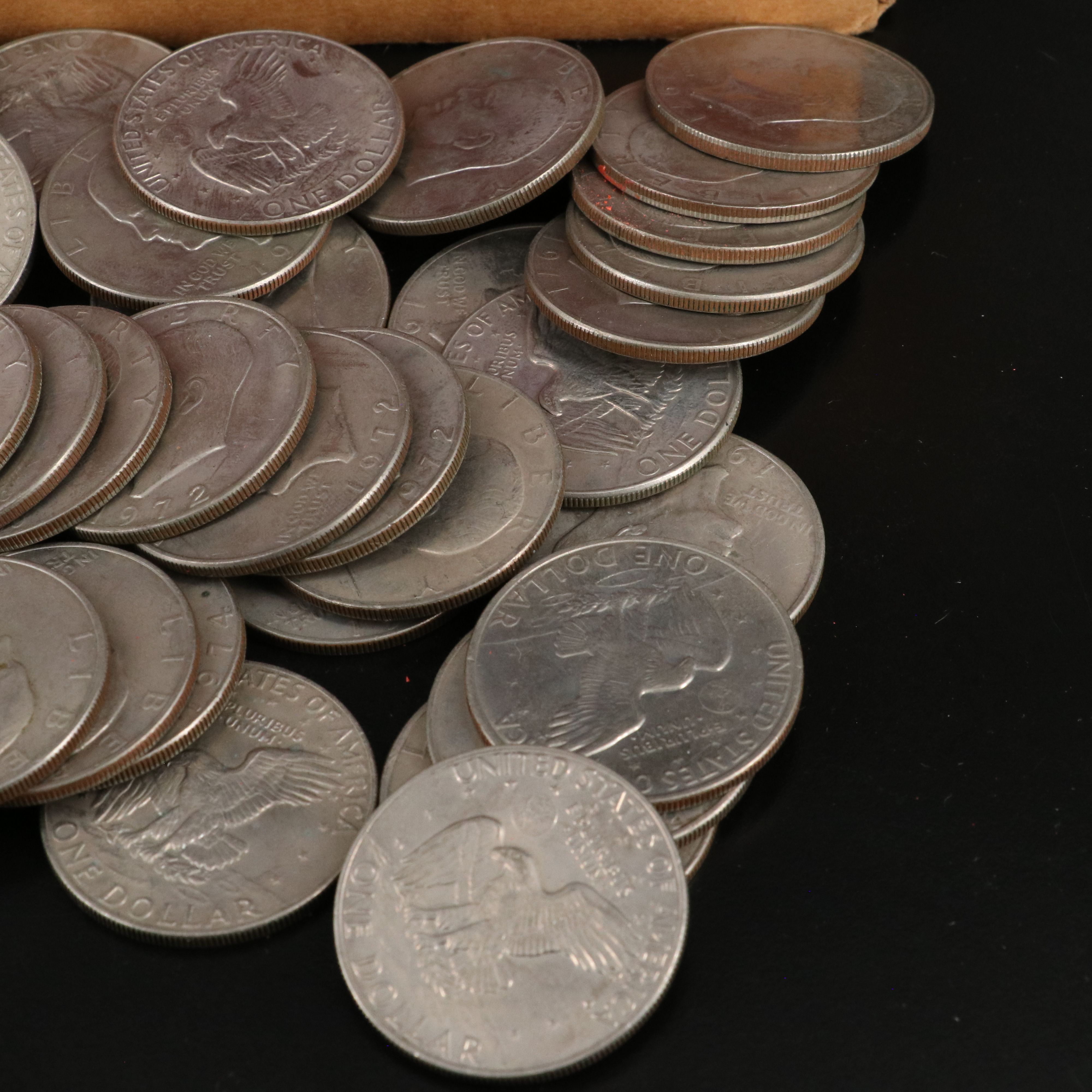 Collection of 2050 State Quarters in Bank Rolls and 68 Eisenhower Dollars