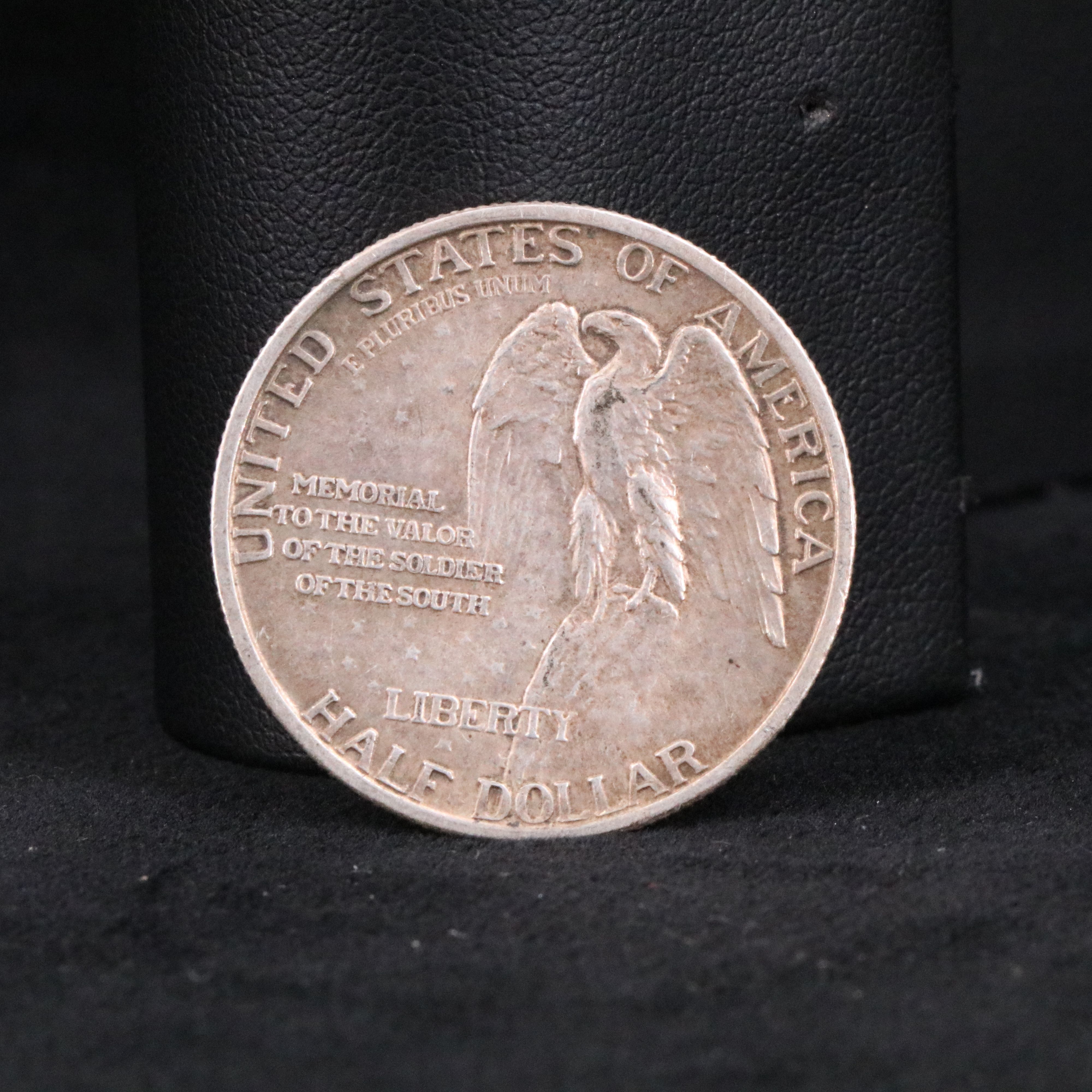 Four Indian Cents, a 3 Cent Silver, and Two Stone Mountain Half Dollars
