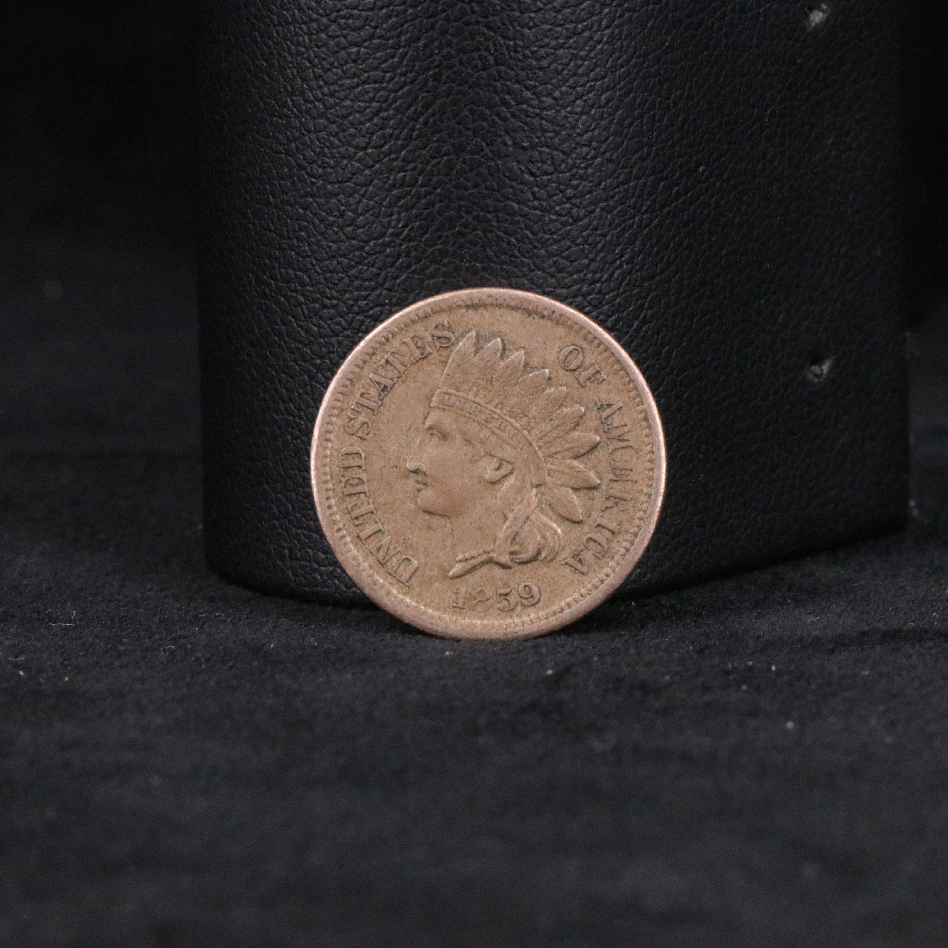 Four Indian Cents, a 3 Cent Silver, and Two Stone Mountain Half Dollars