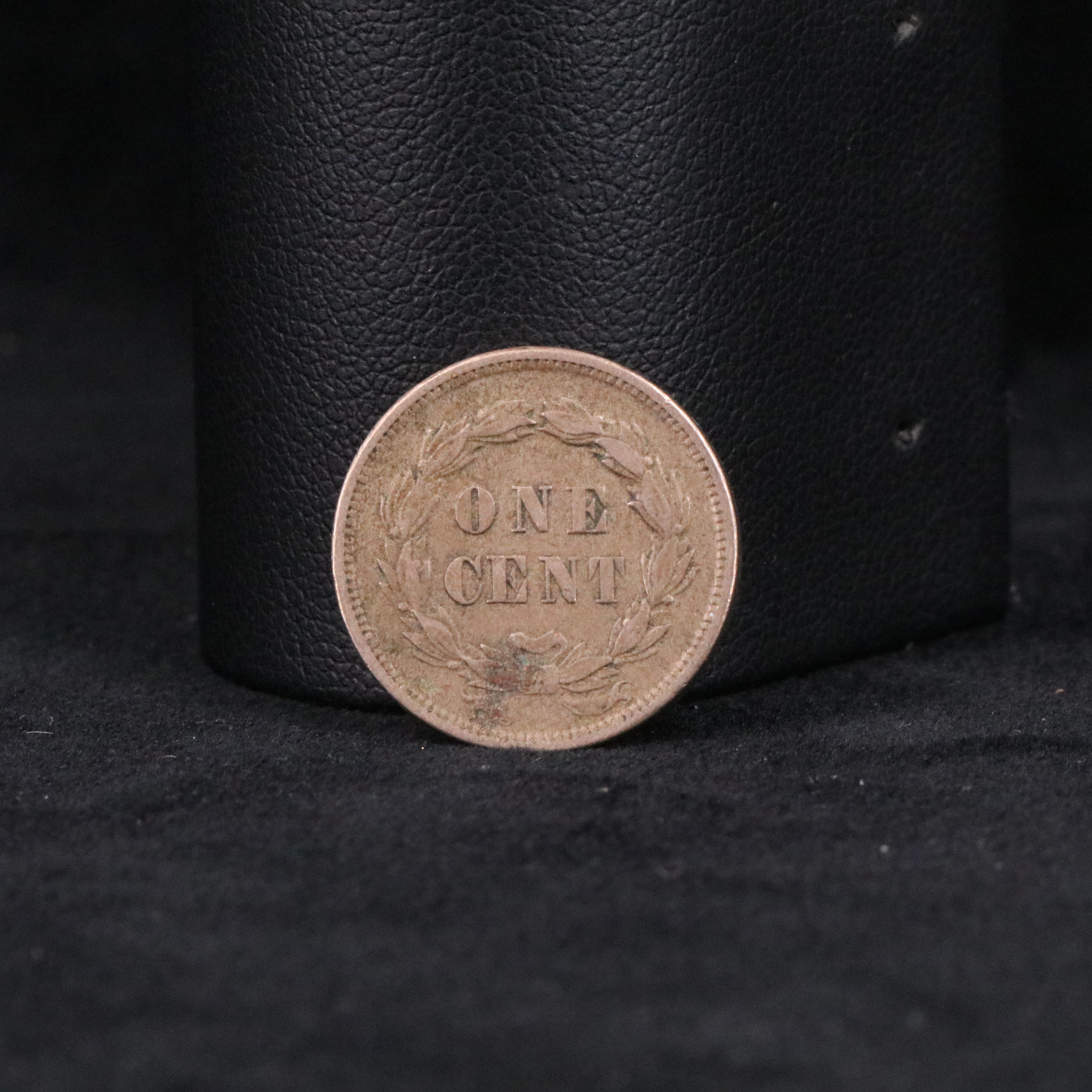 Four Indian Cents, a 3 Cent Silver, and Two Stone Mountain Half Dollars