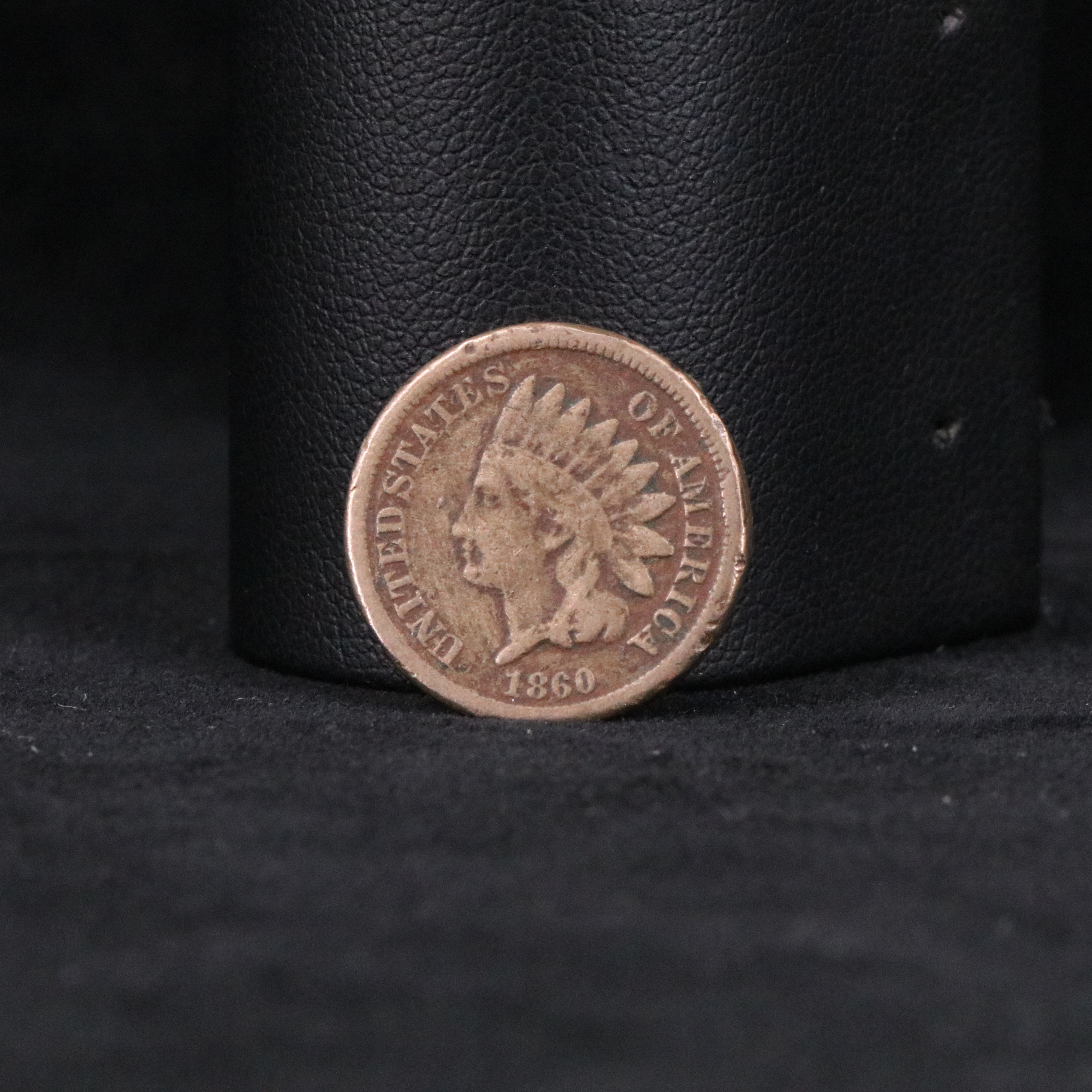 Four Indian Cents, a 3 Cent Silver, and Two Stone Mountain Half Dollars