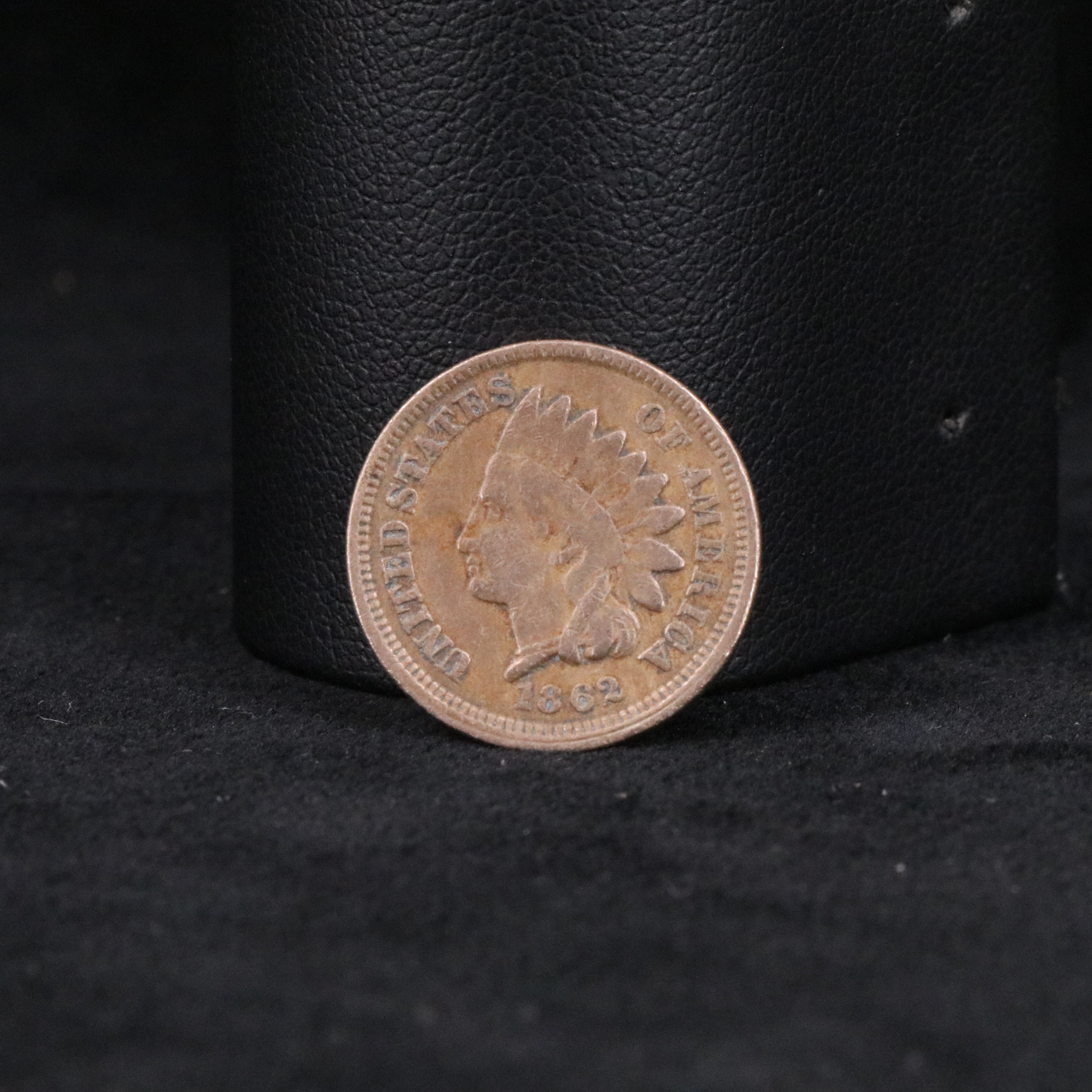 Four Indian Cents, a 3 Cent Silver, and Two Stone Mountain Half Dollars