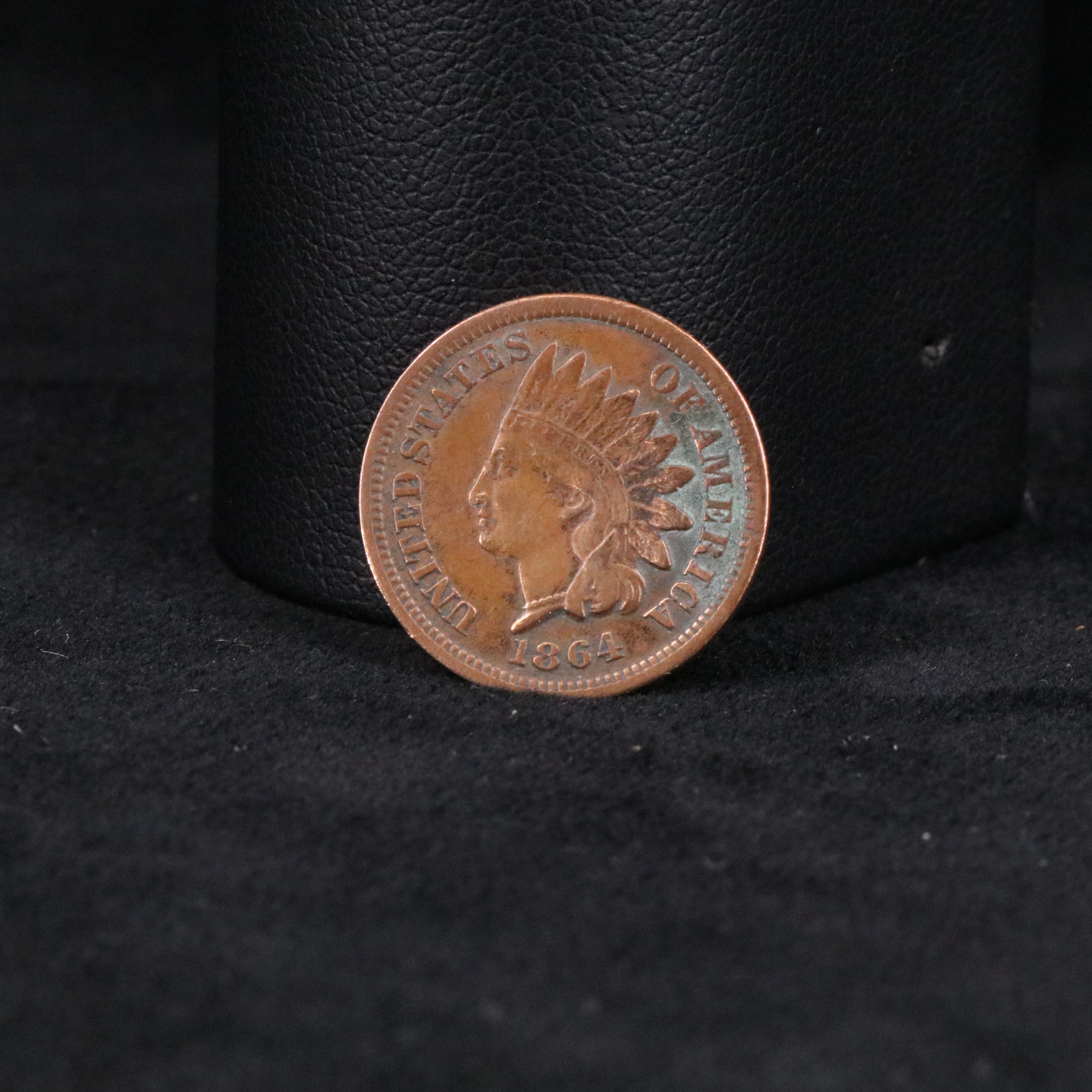 Four Indian Cents, a 3 Cent Silver, and Two Stone Mountain Half Dollars