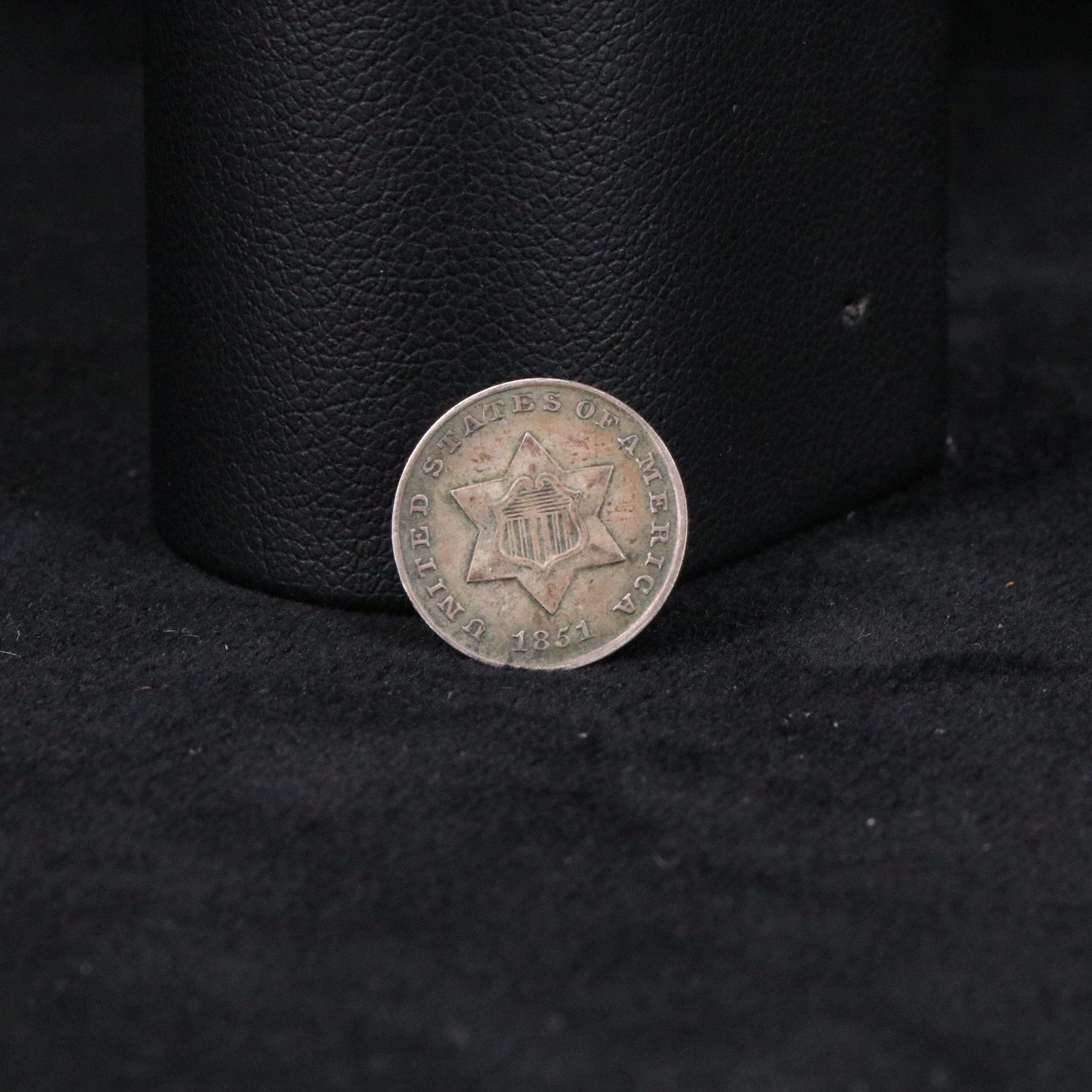 Four Indian Cents, a 3 Cent Silver, and Two Stone Mountain Half Dollars