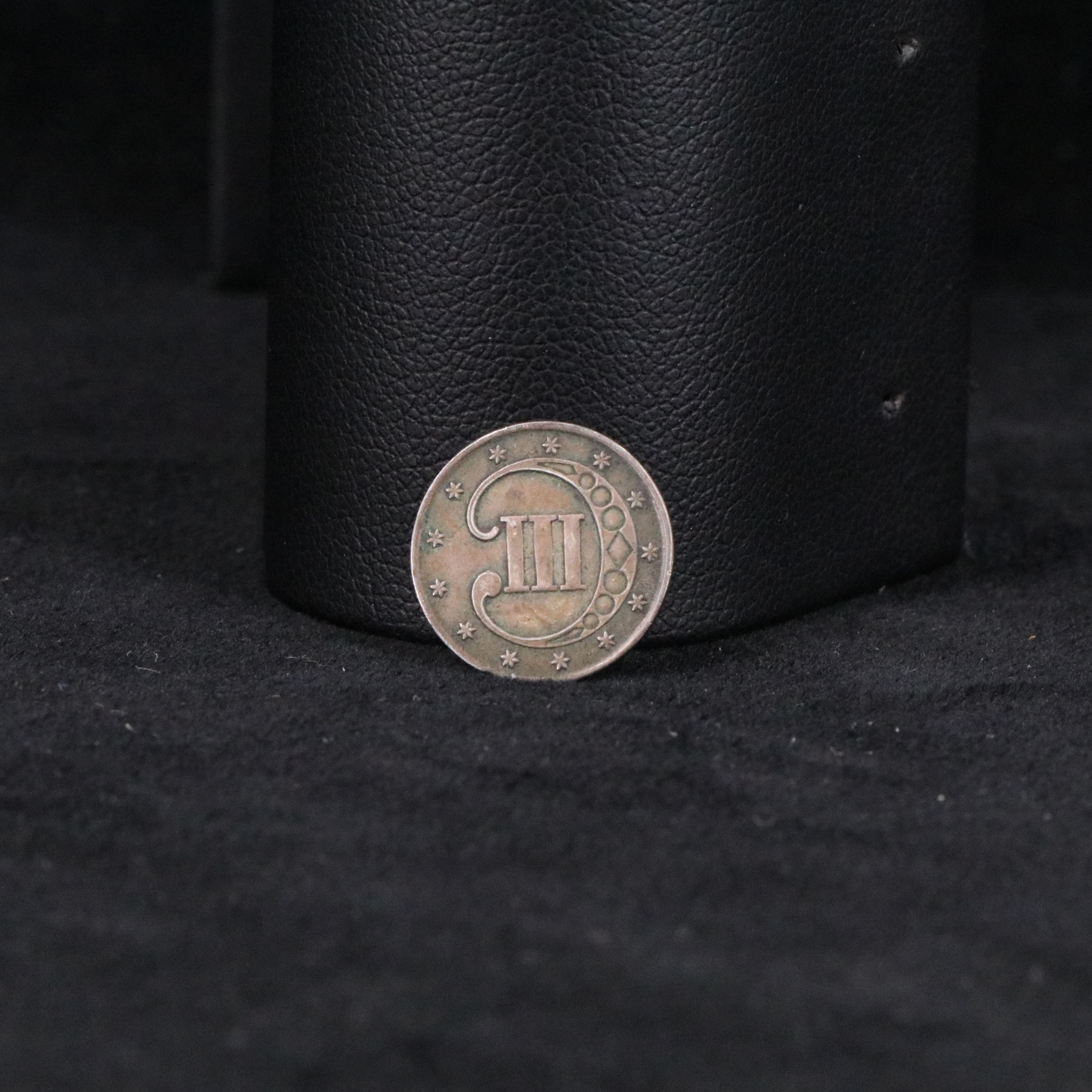 Four Indian Cents, a 3 Cent Silver, and Two Stone Mountain Half Dollars