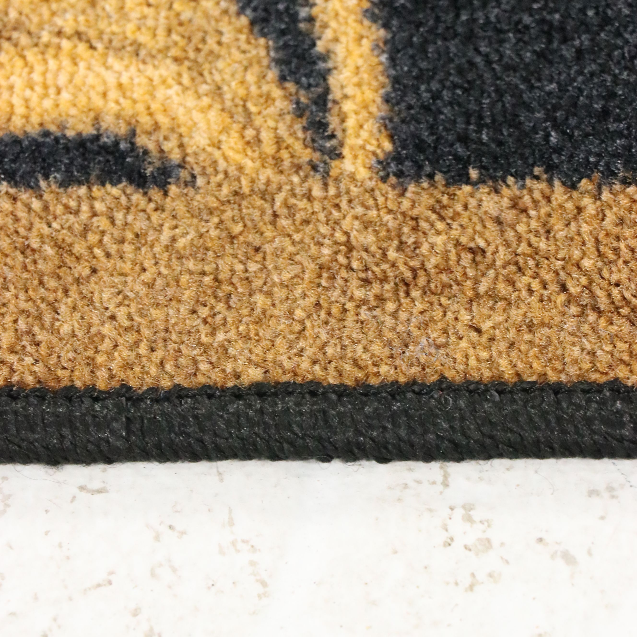 7'10 x 10'10 Machine Made Joy Carpets Black and Gold Area Rug