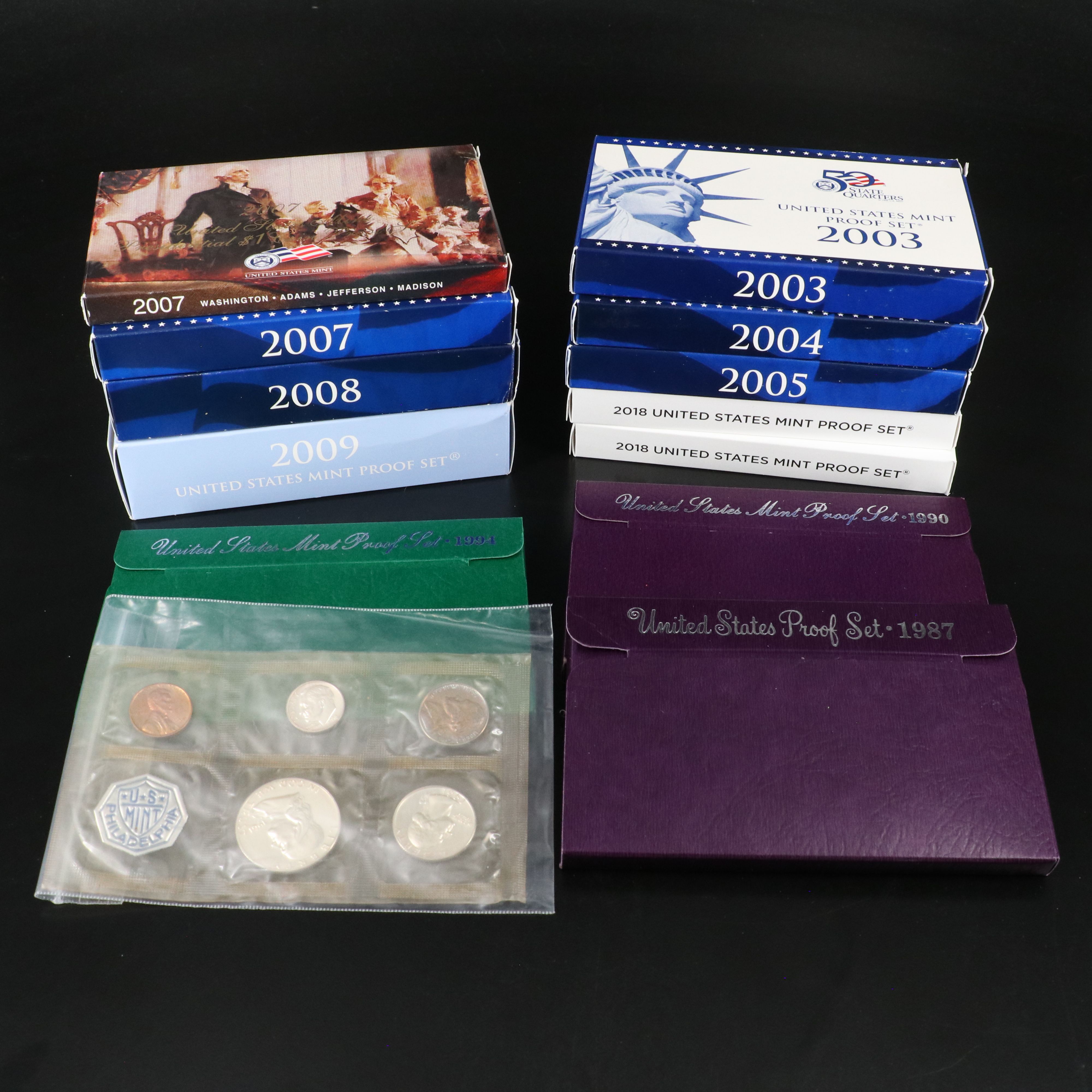 Twelve U.S. Mint Proof Sets, Including Silver 1961 Set