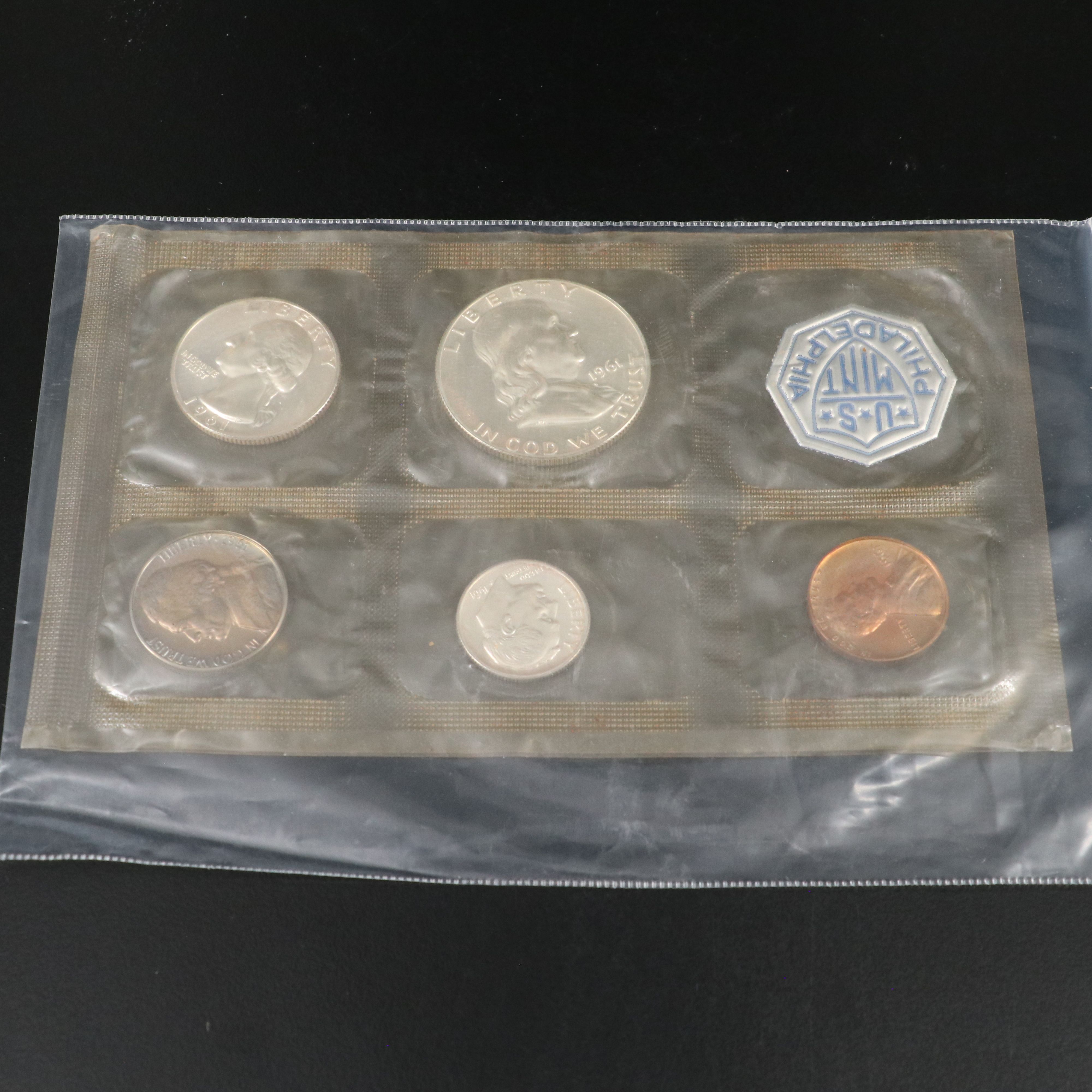 Twelve U.S. Mint Proof Sets, Including Silver 1961 Set