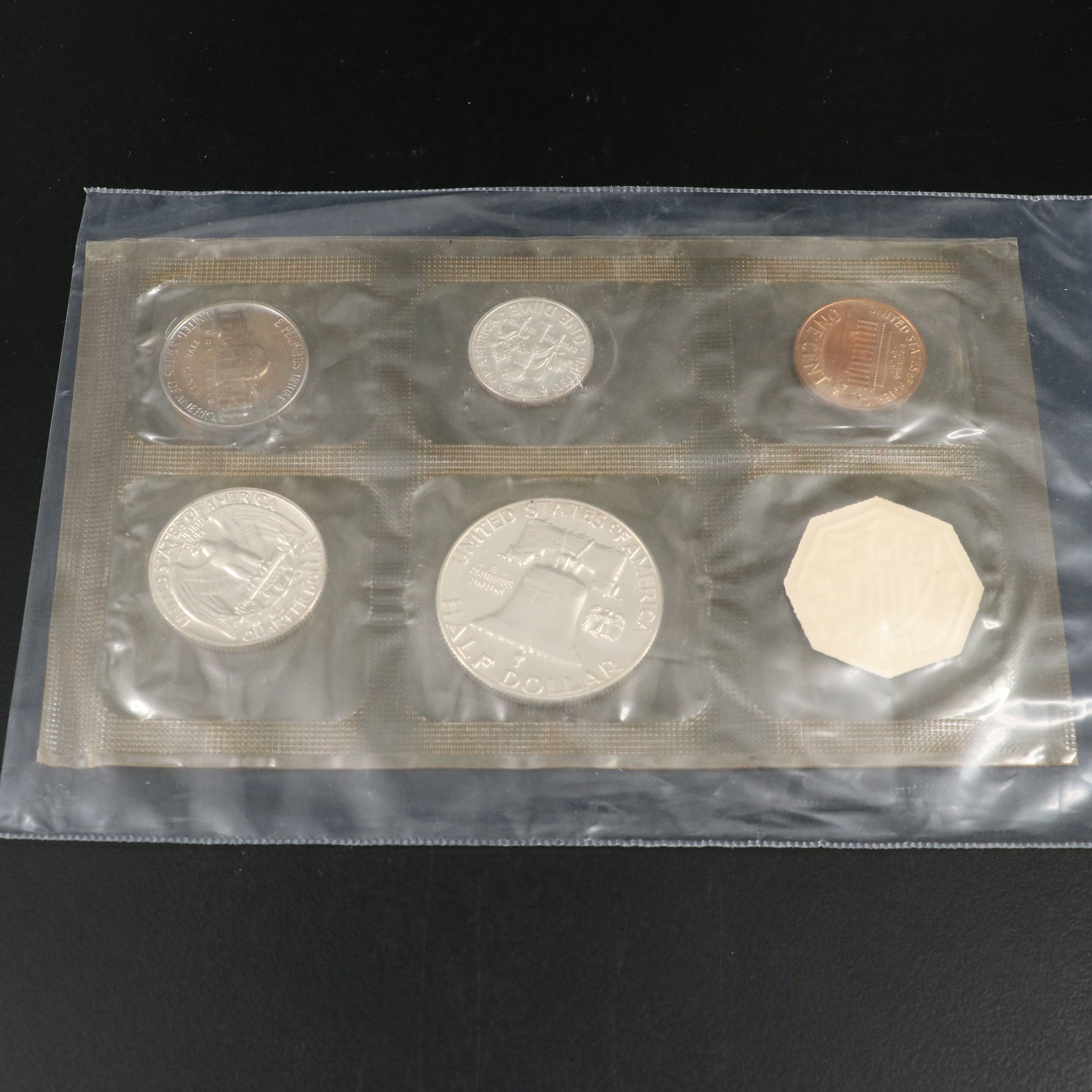 Twelve U.S. Mint Proof Sets, Including Silver 1961 Set