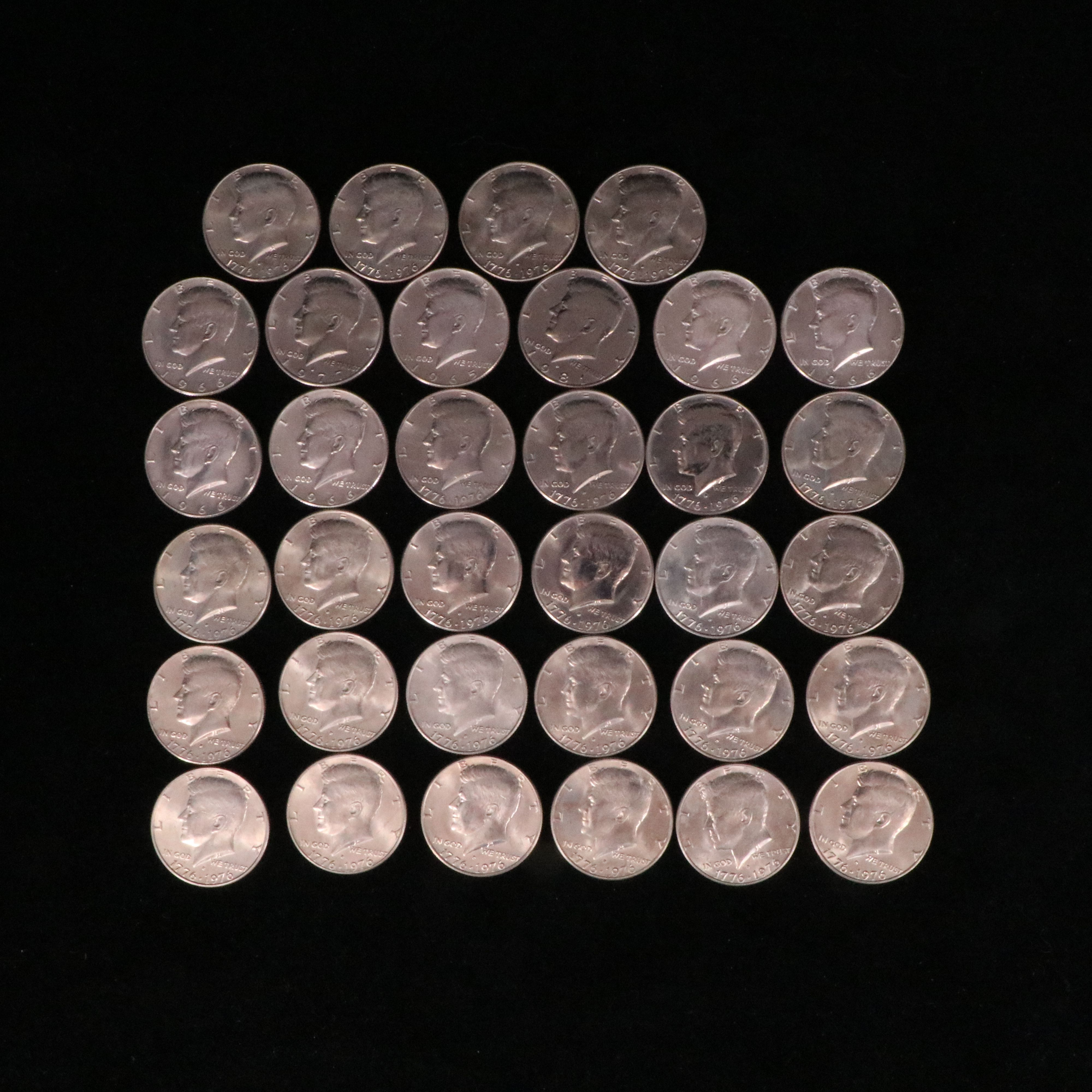 8 Silver Kennedy Half Dollars with 26 Copper-Nickel Bicentennial Half Dollars