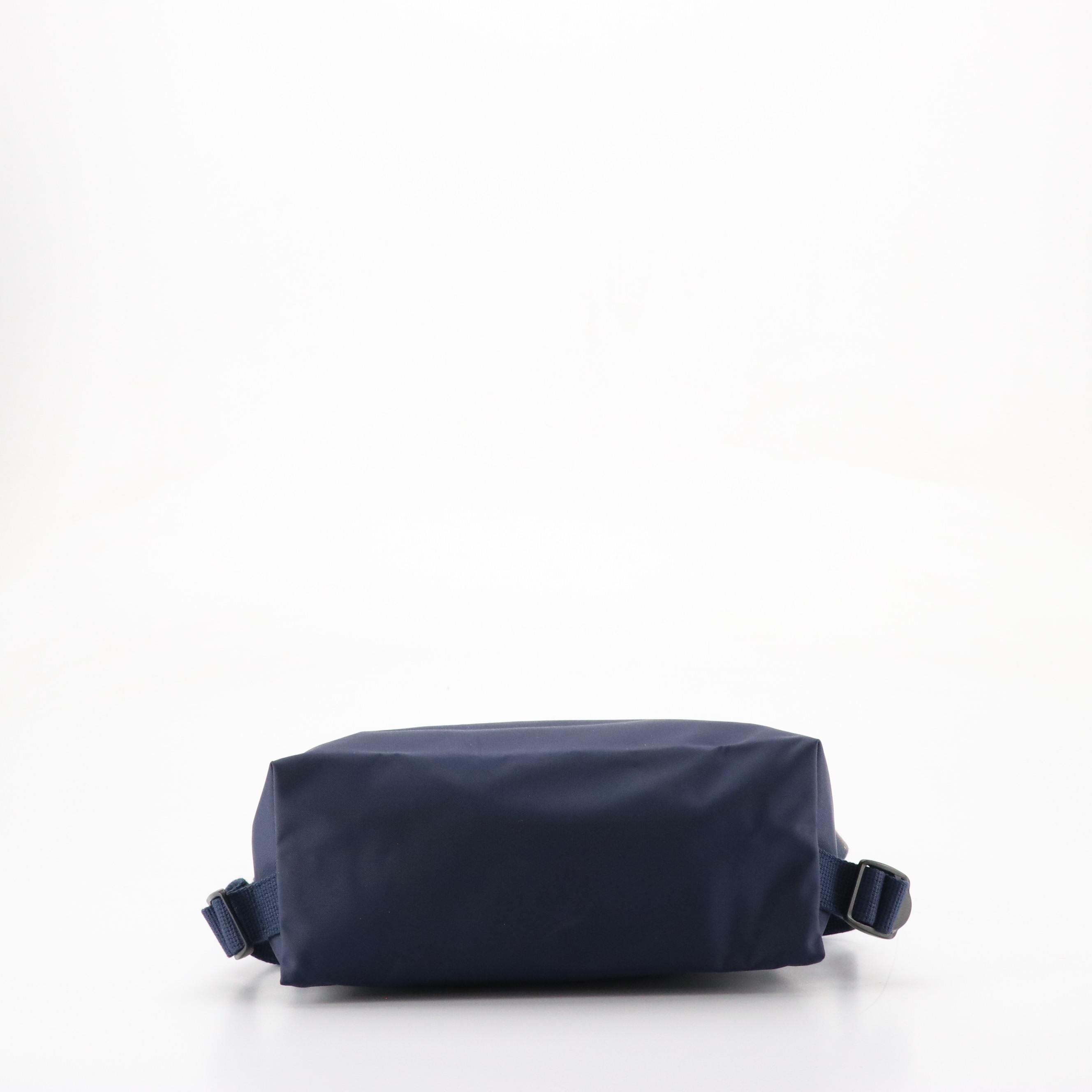 Longchamp Le Pliage Backpack in Navy Blue Nylon Canvas and Leather Trim