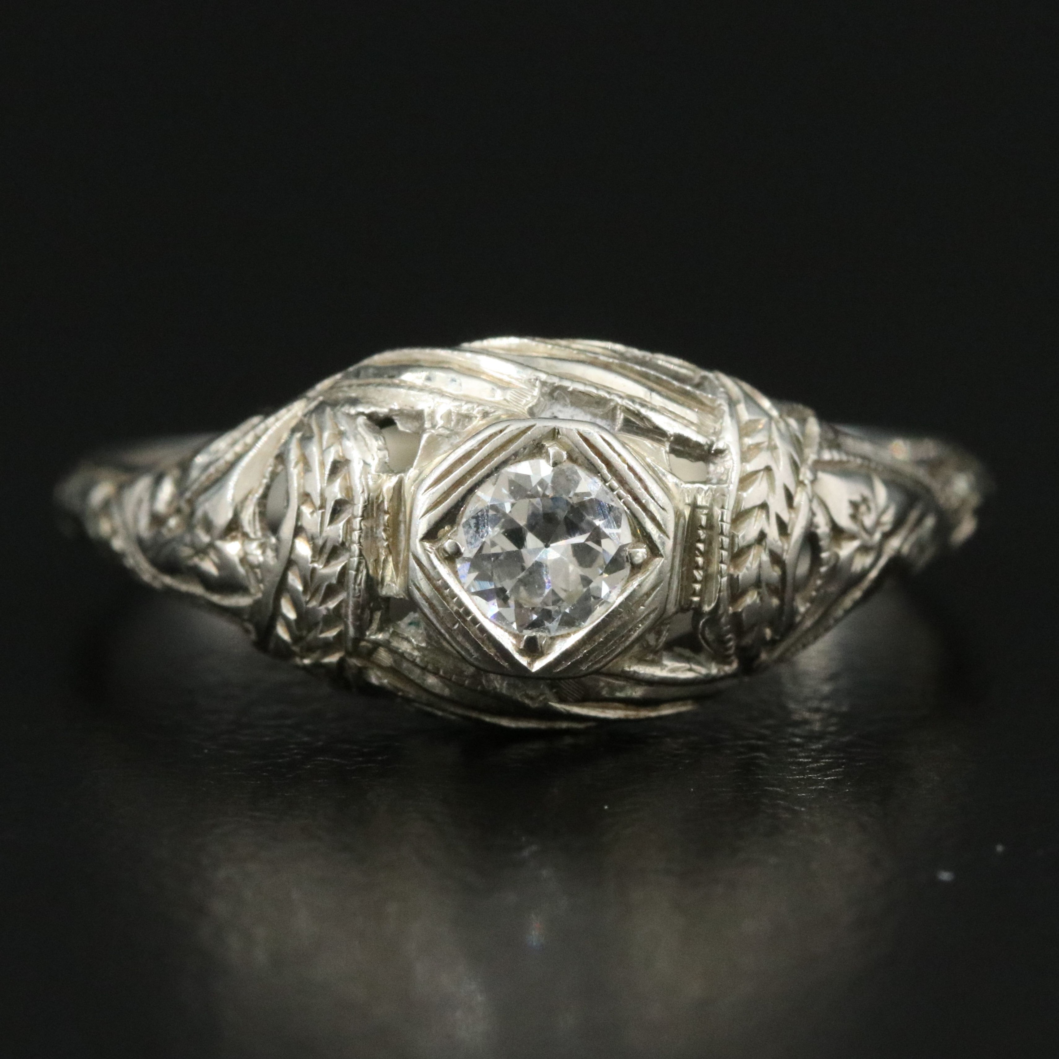 Edwardian 18K 0.21 CT Diamond Solitaire Ring with Engraved Orange Blossom Design