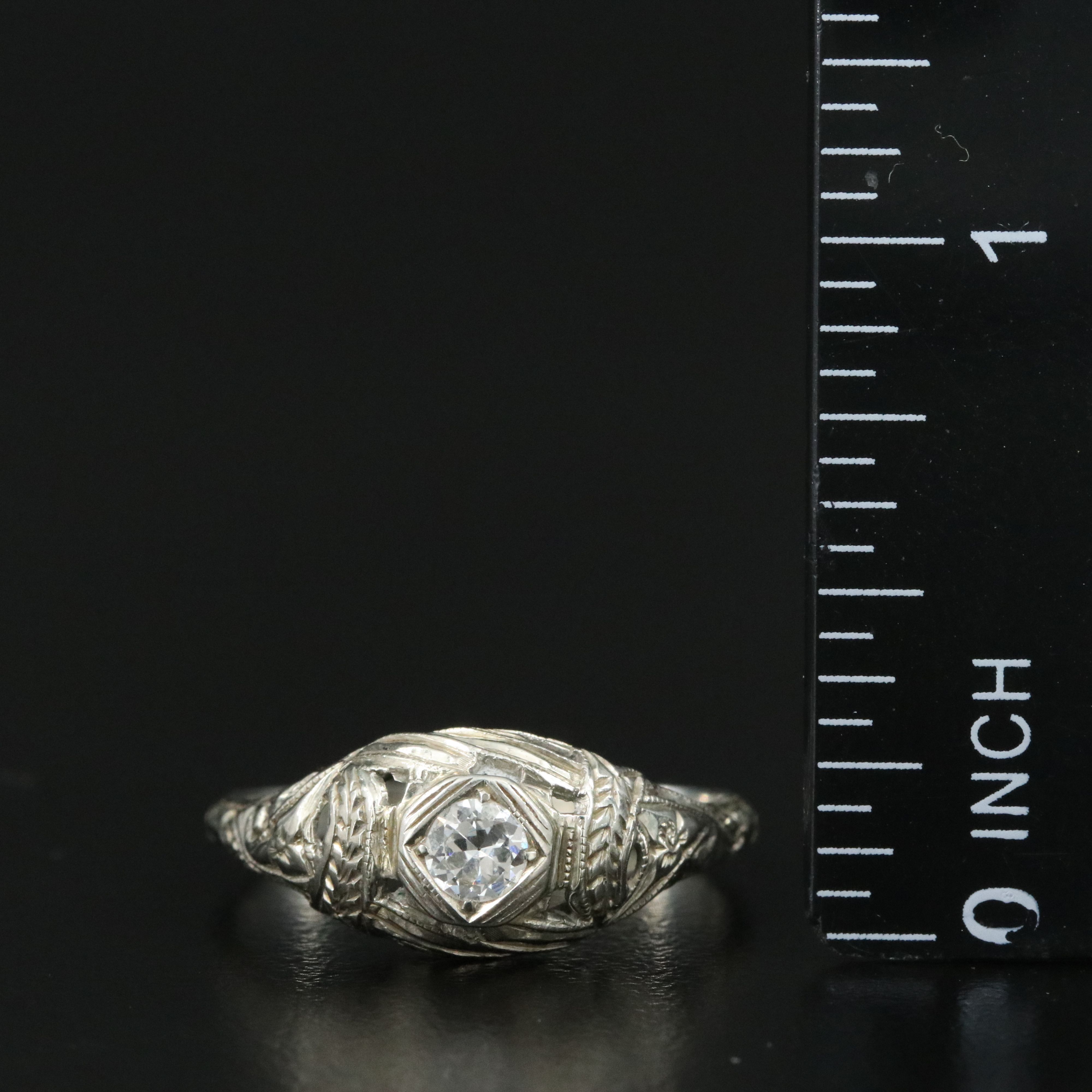 Edwardian 18K 0.21 CT Diamond Solitaire Ring with Engraved Orange Blossom Design