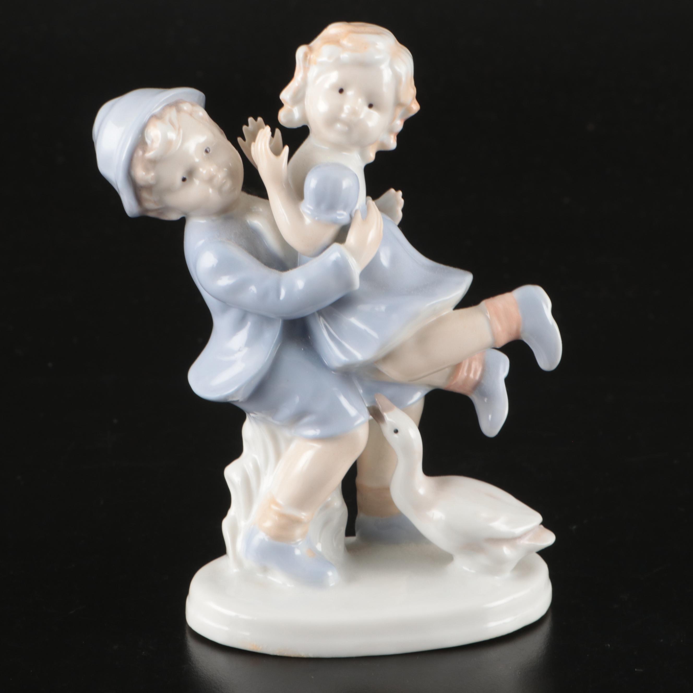 Royal Copenhagen "Girl with Doll" Porcelain Figurine and More