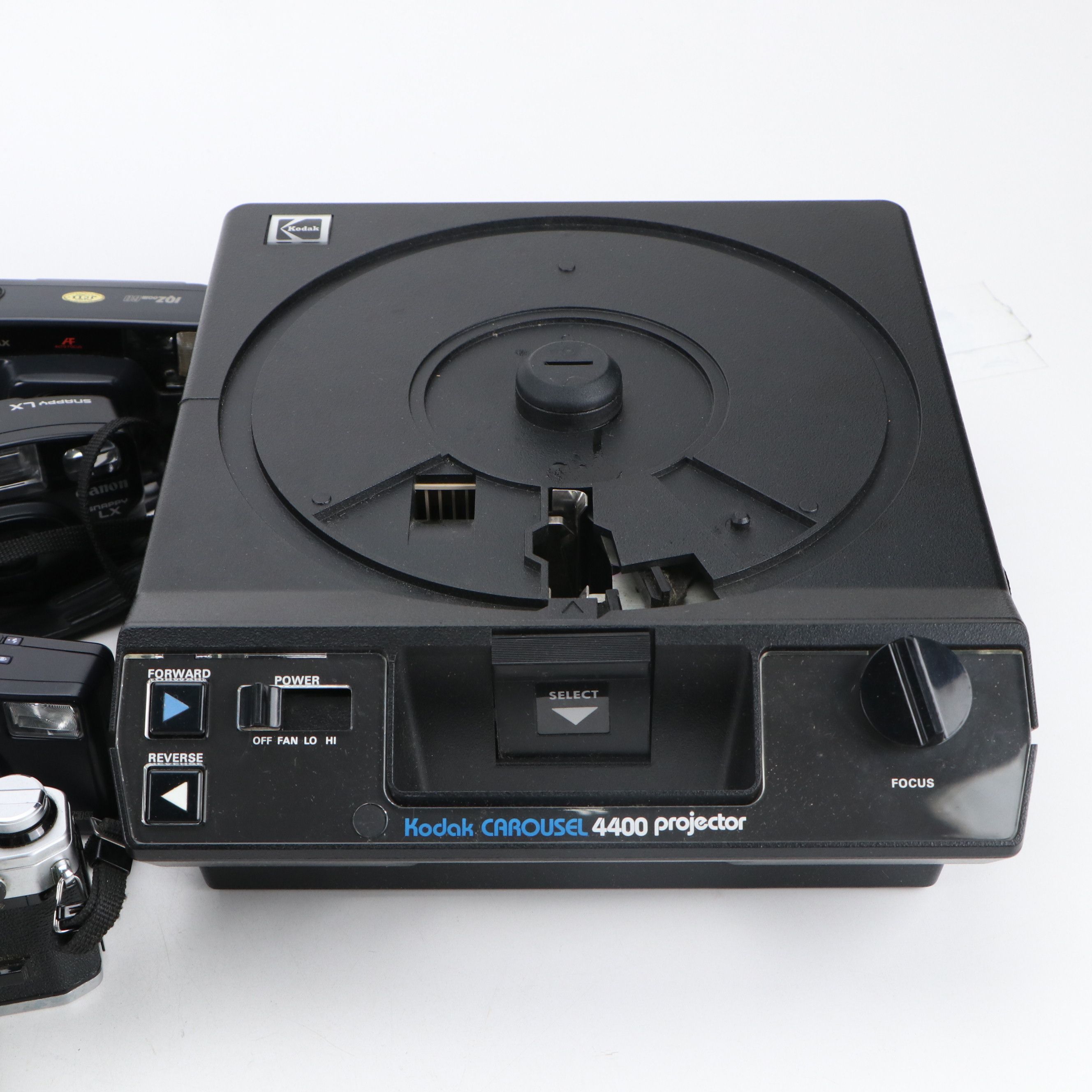 Canon, Pentax, and More Still Cameras with Kodak Carousel Projector and More