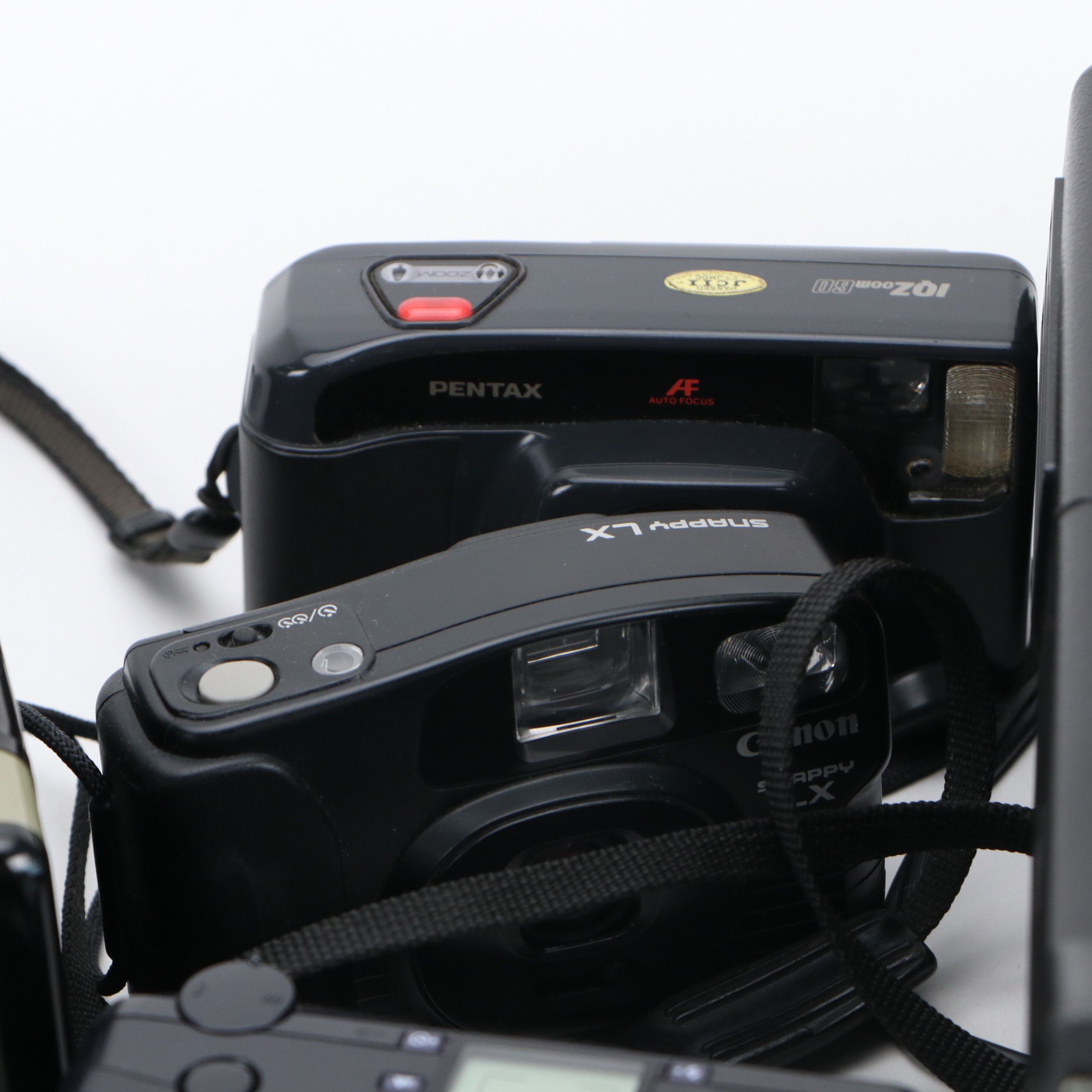 Canon, Pentax, and More Still Cameras with Kodak Carousel Projector and More