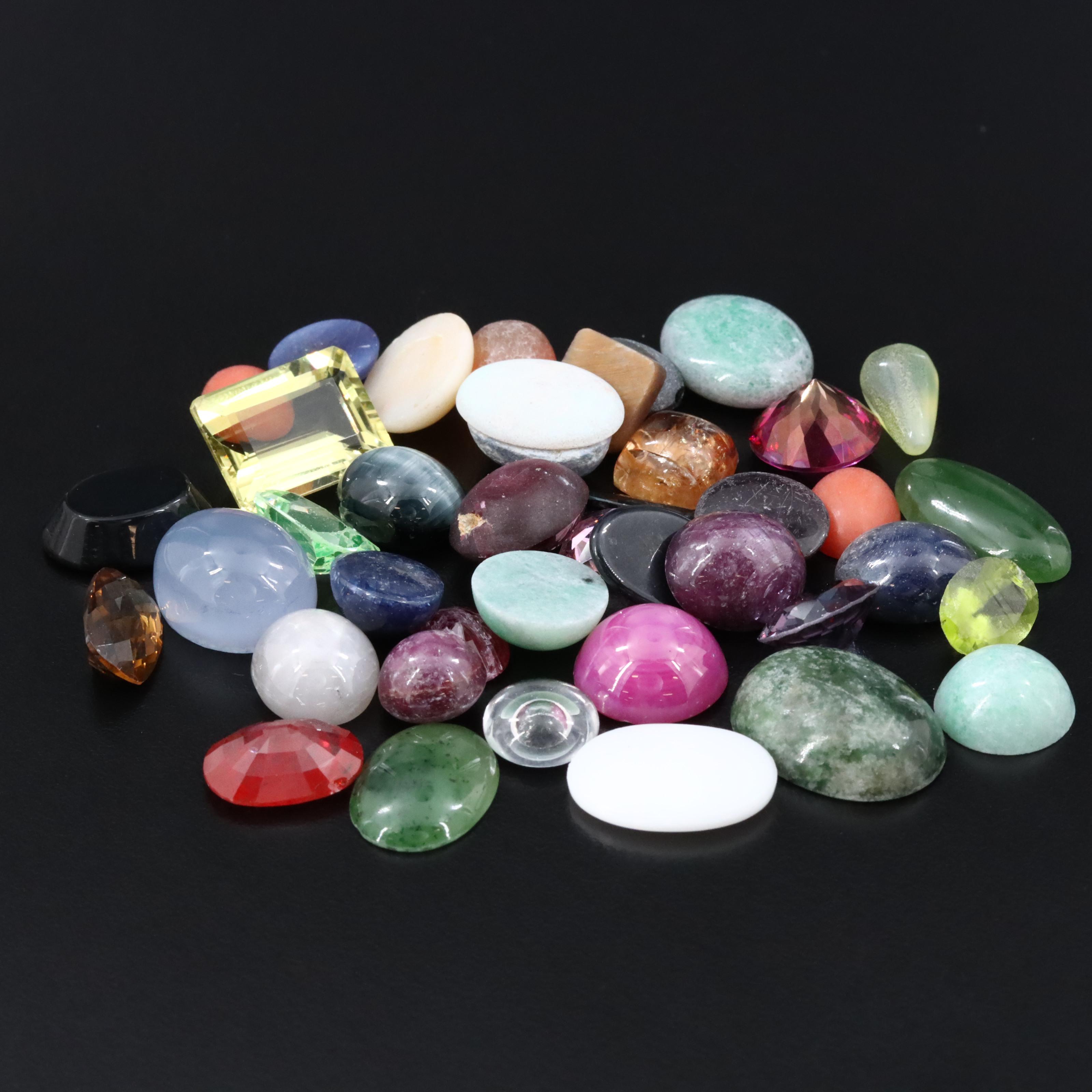Loose Gemstones Including Citrine, Opal and Star Sapphire