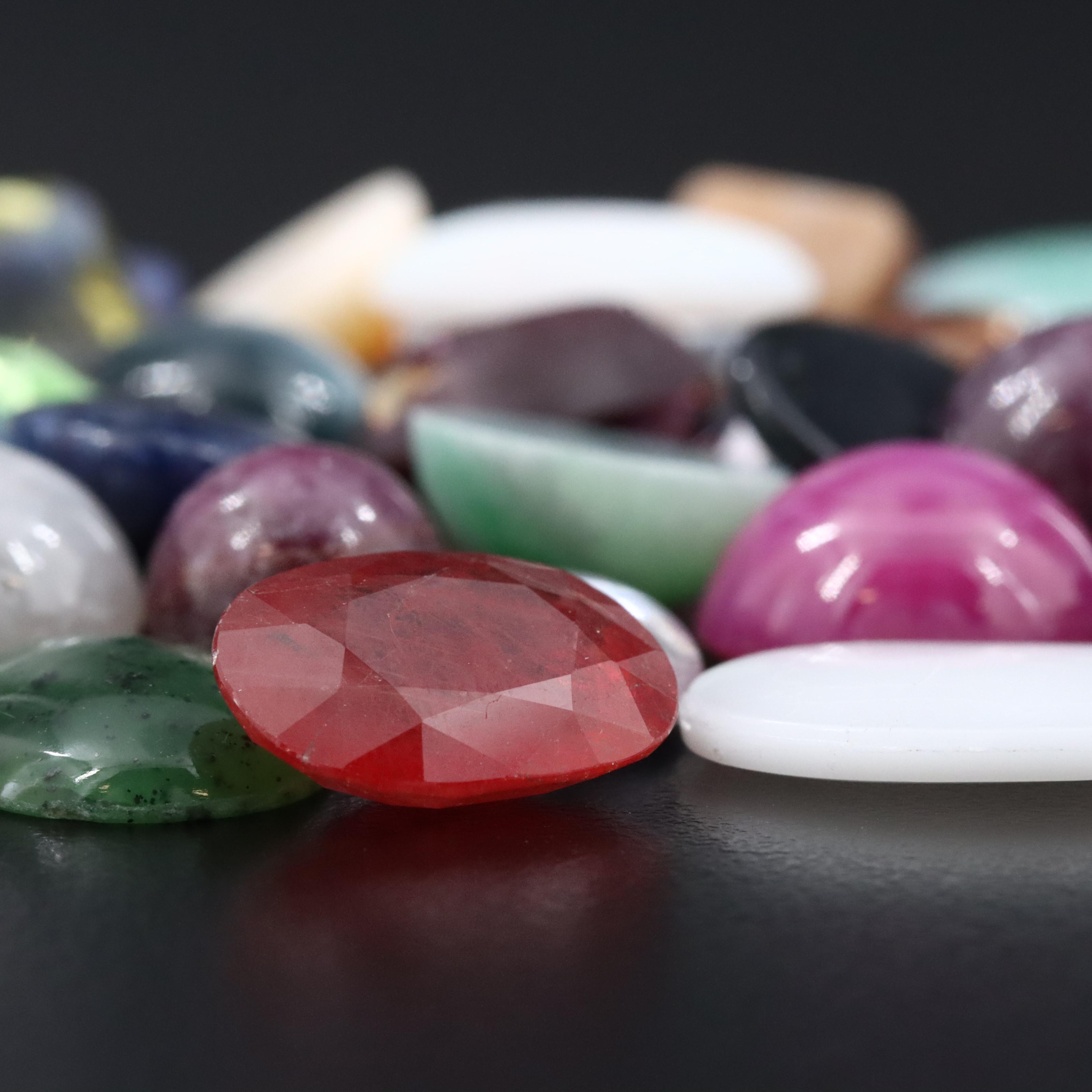 Loose Gemstones Including Citrine, Opal and Star Sapphire