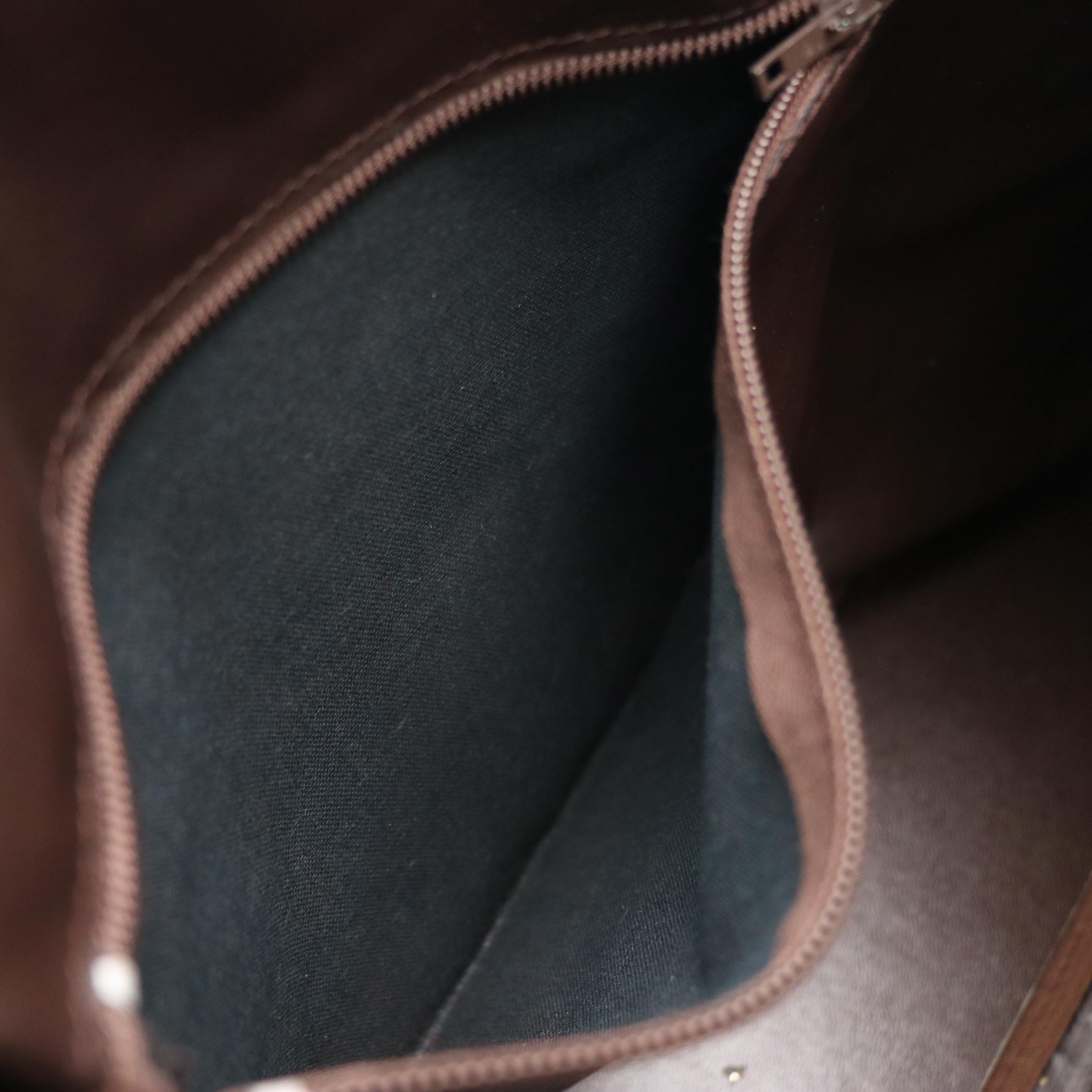 Burberrys Vintage Domed Zip Handbag in House Check Canvas and Brown Leather Trim