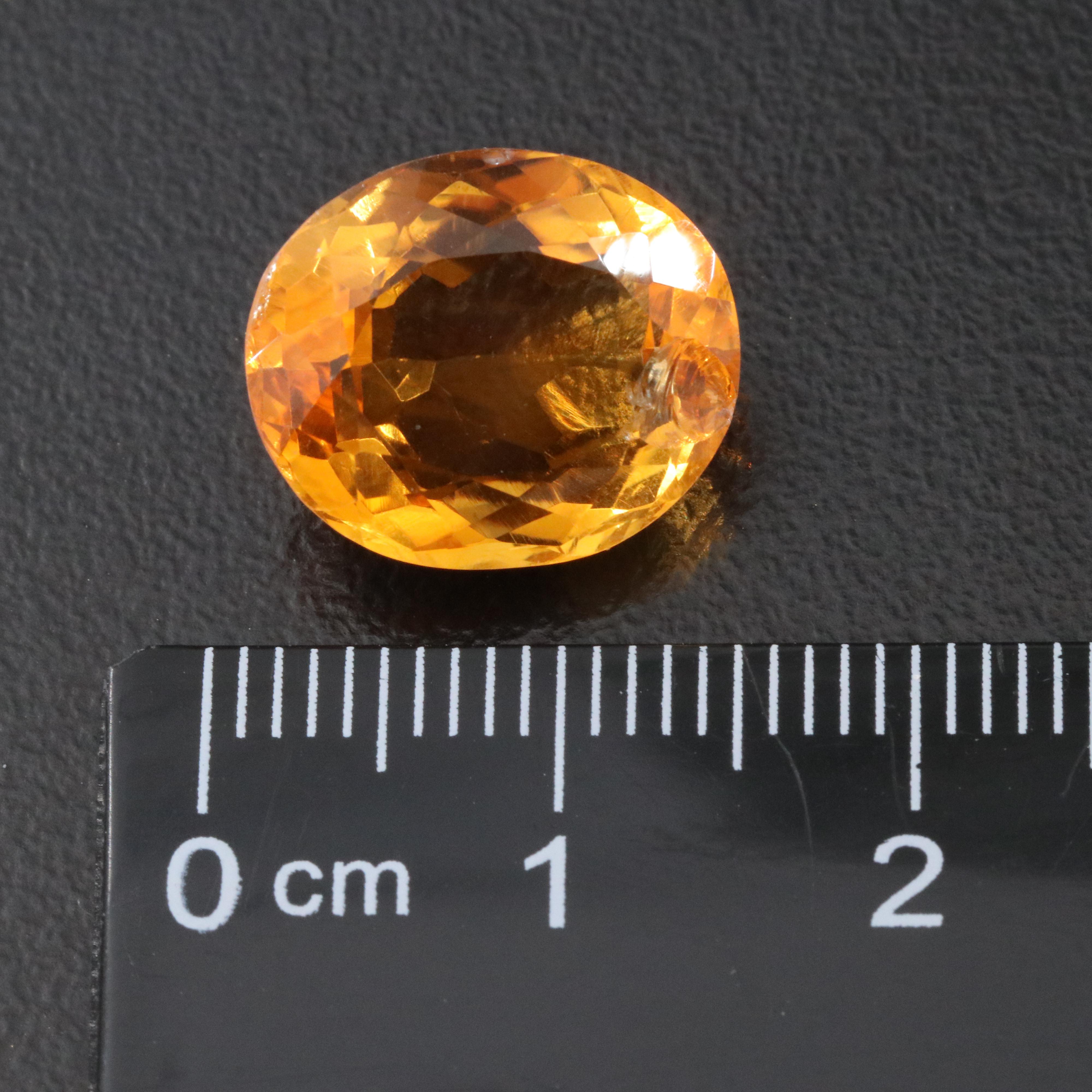 Loose 82.97 CTW Gemstone Lot Including Citrine, Lab Grown Sapphire and Glass