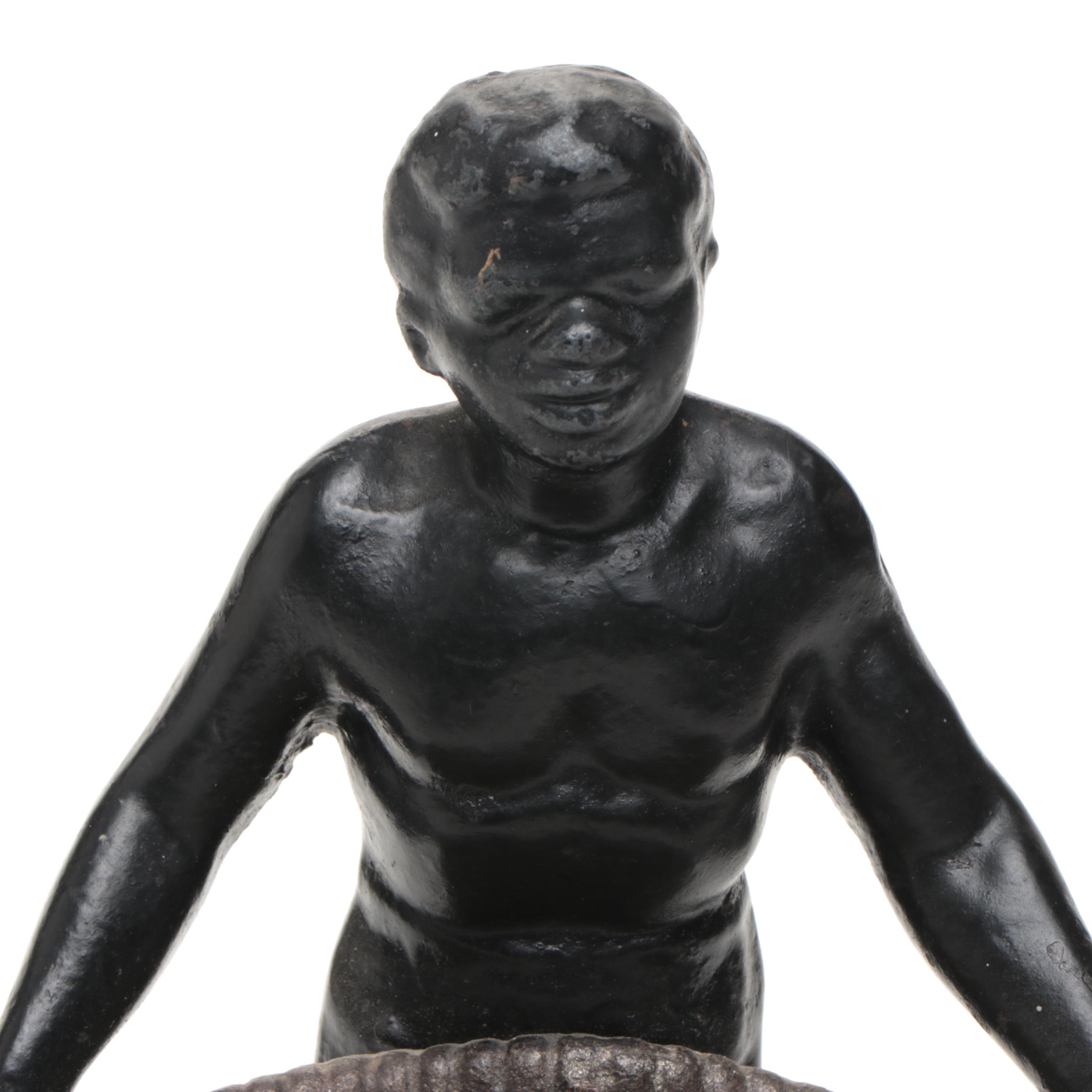 Metal Blackamoor Figure of Man Holding Woven Basket