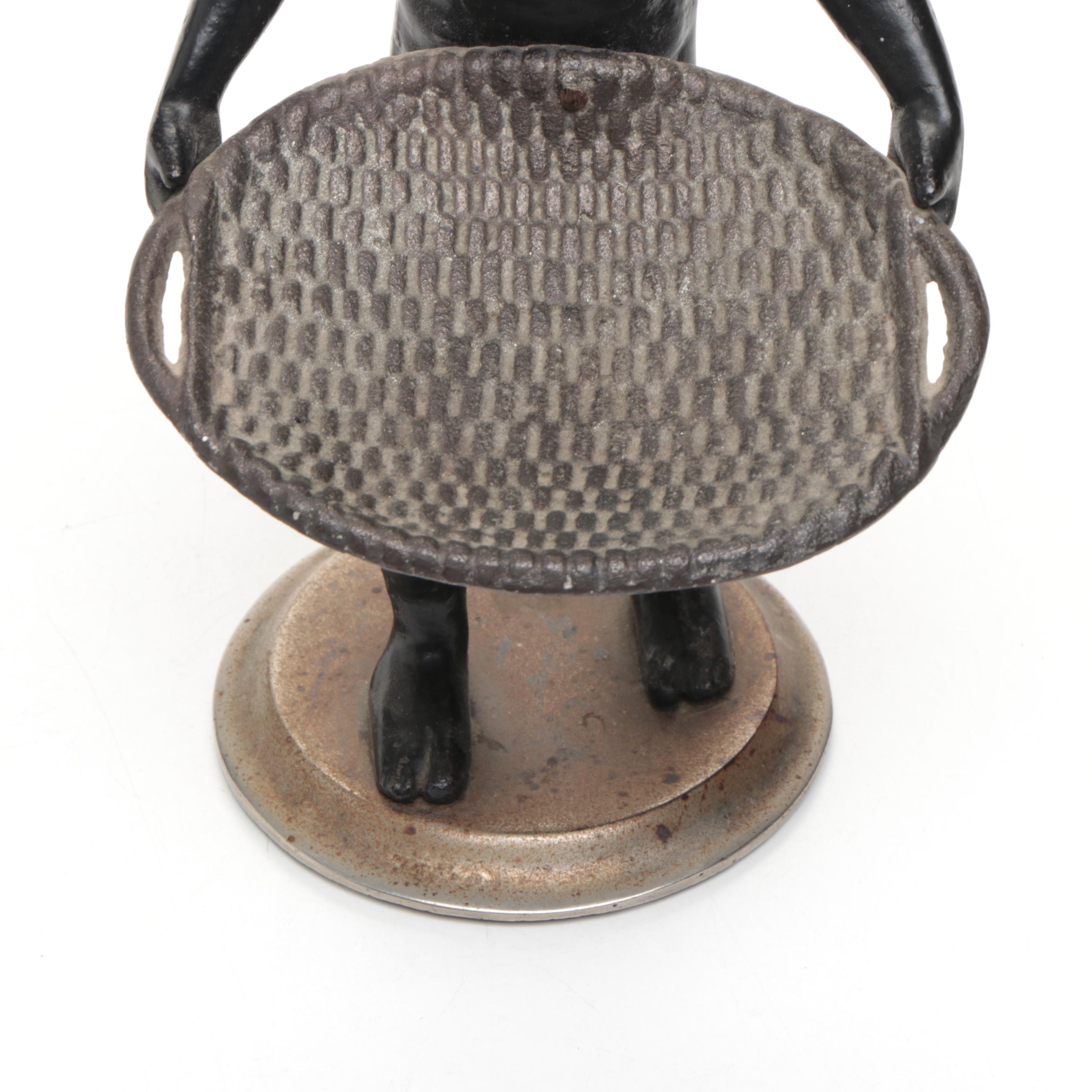 Metal Blackamoor Figure of Man Holding Woven Basket