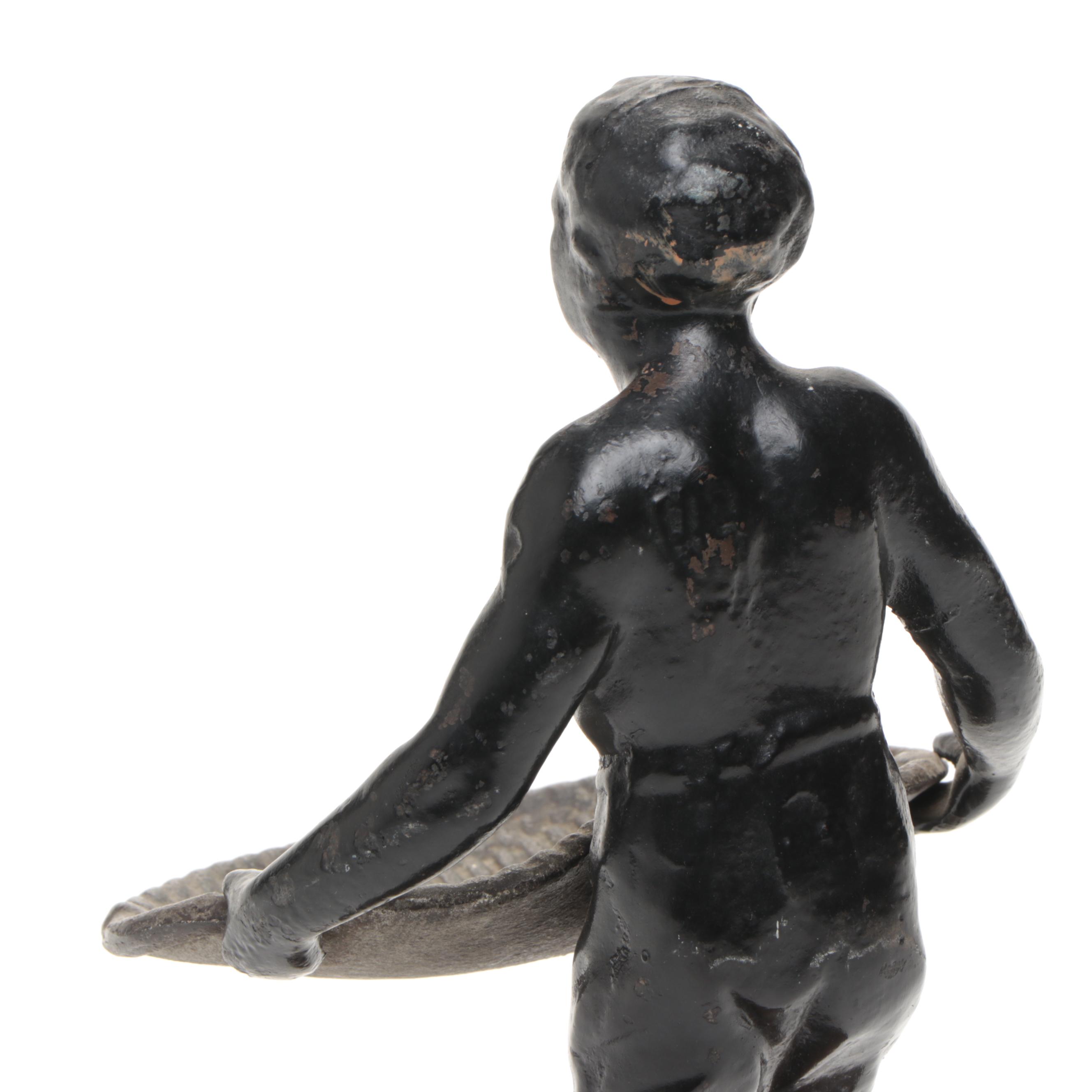 Metal Blackamoor Figure of Man Holding Woven Basket