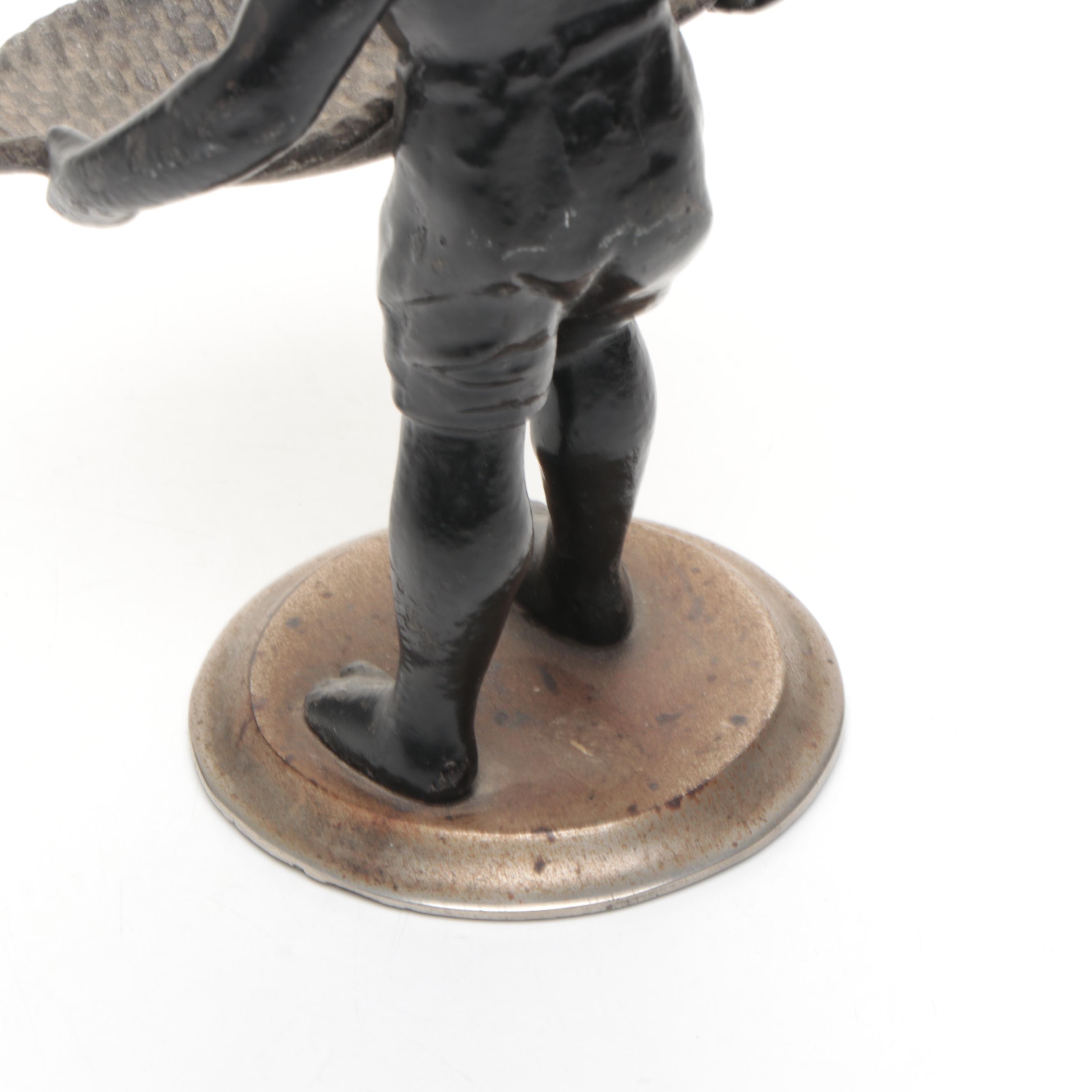 Metal Blackamoor Figure of Man Holding Woven Basket
